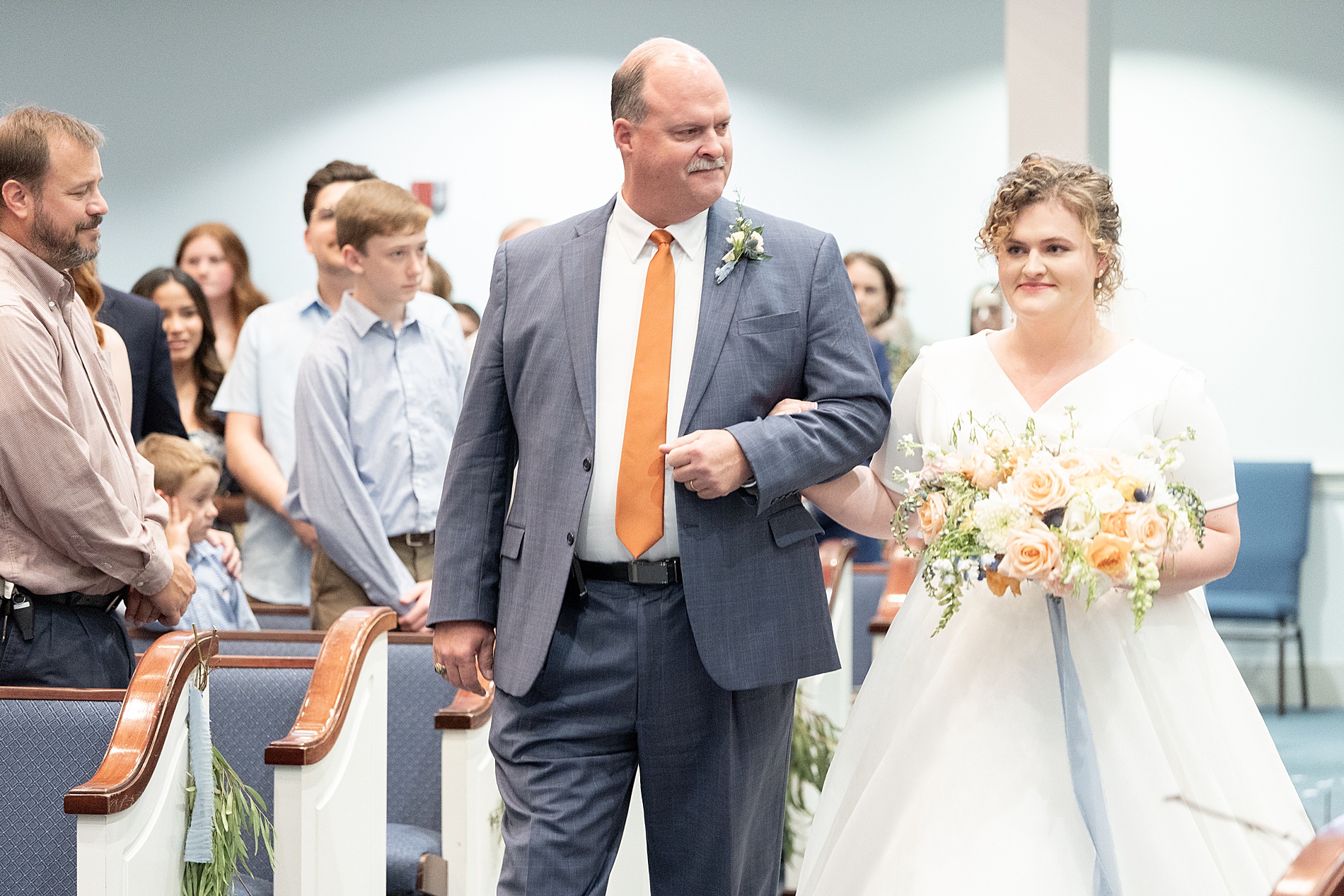 dad walks daughter down the aisle at Elegant South Carolina Wedding