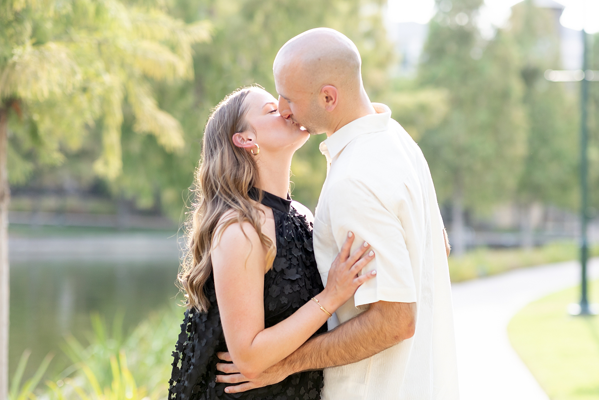 couple kiss during Golden Hour Engagement Session
