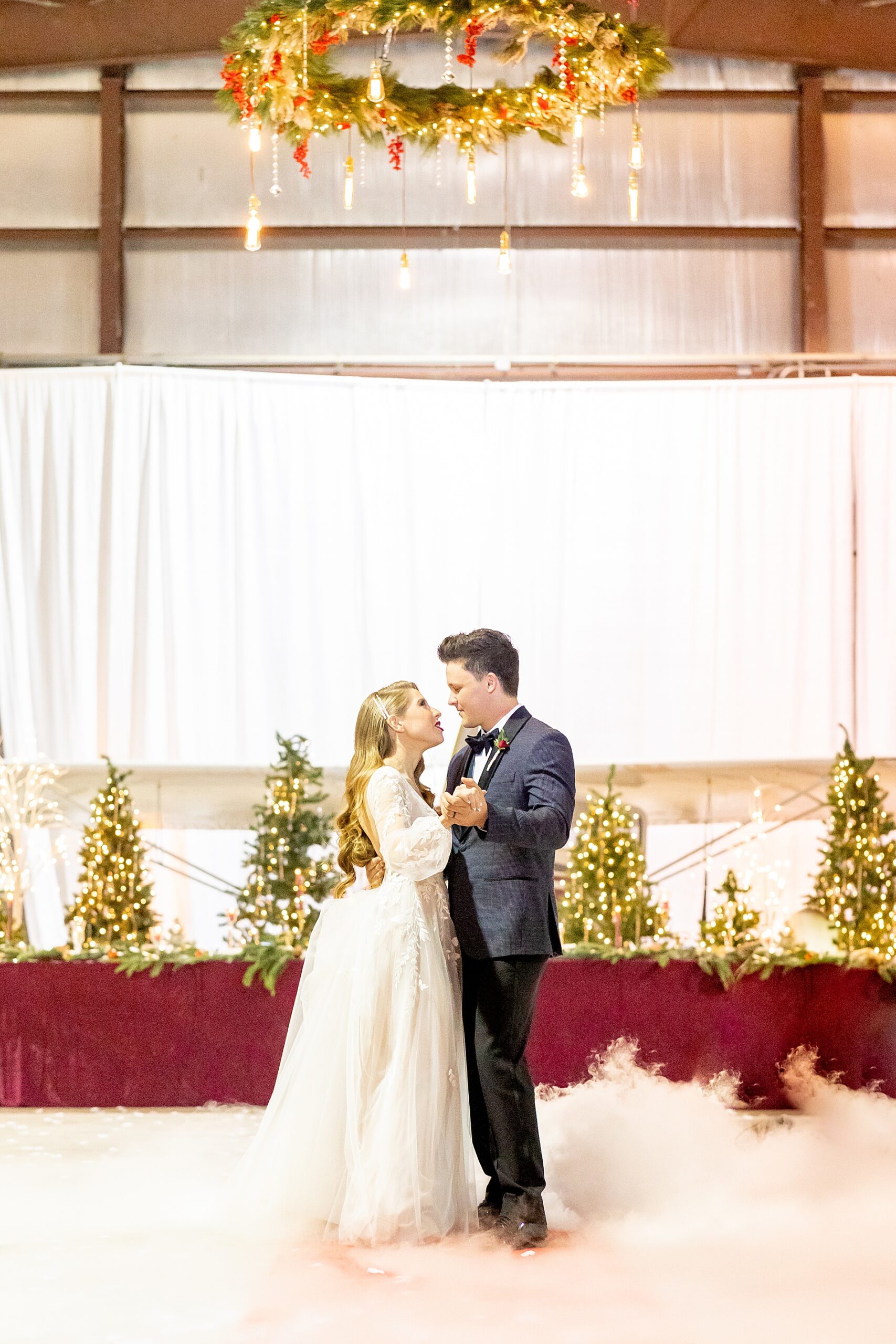 Newlyweds dance together at Romantic Vintage Christmas Wedding