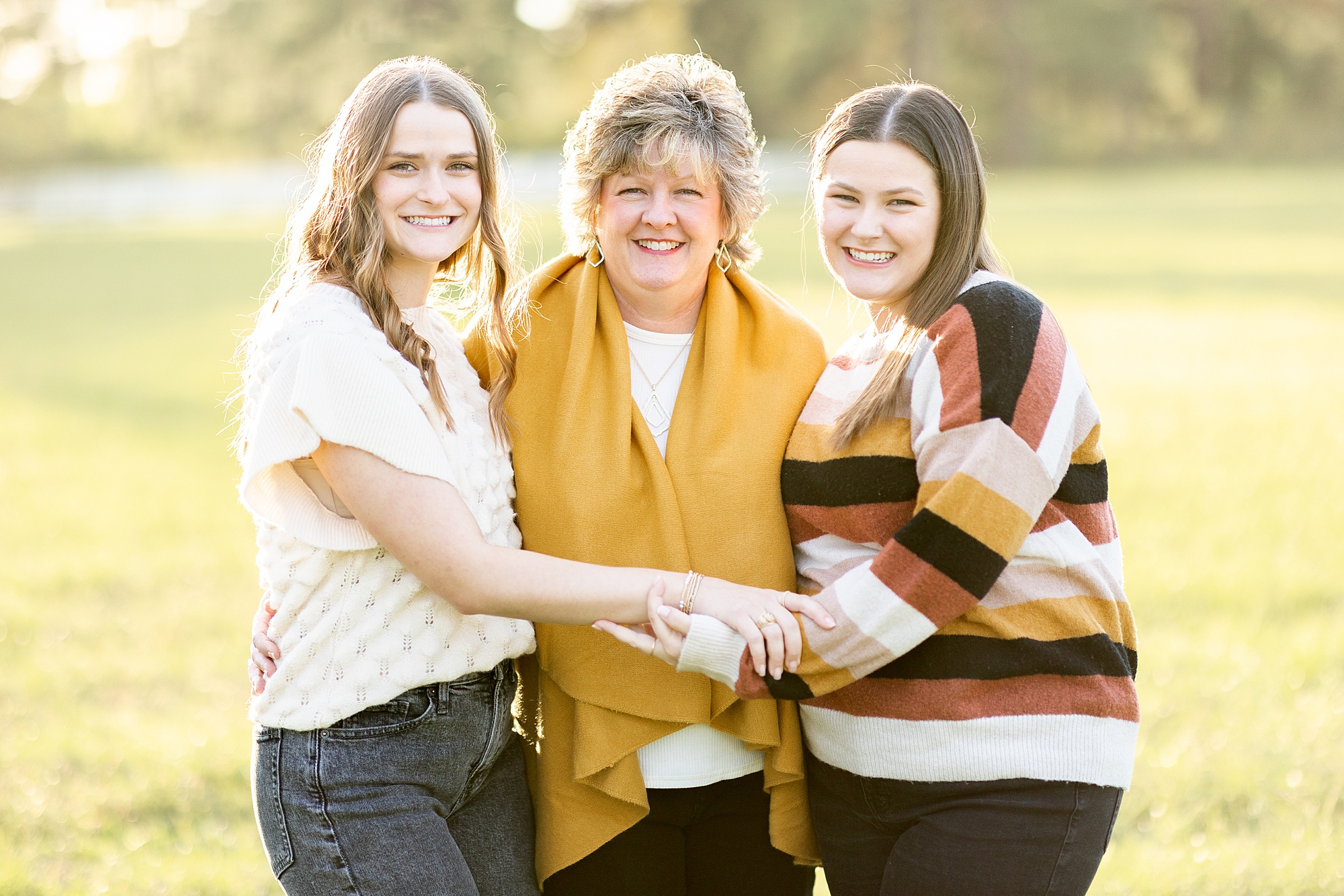 mom and daughters during family portraits