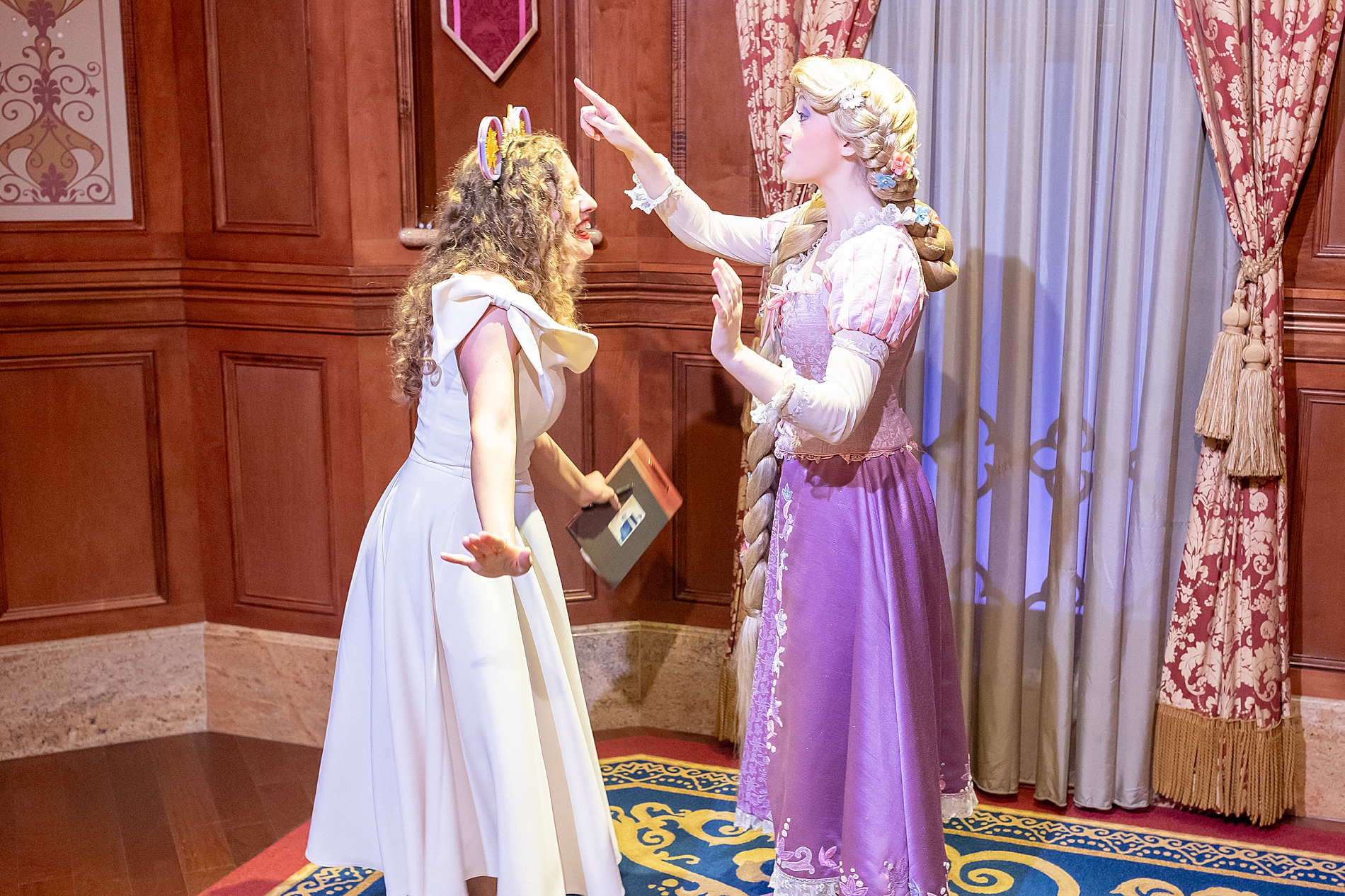 woman meets Rapunzel at Disney 