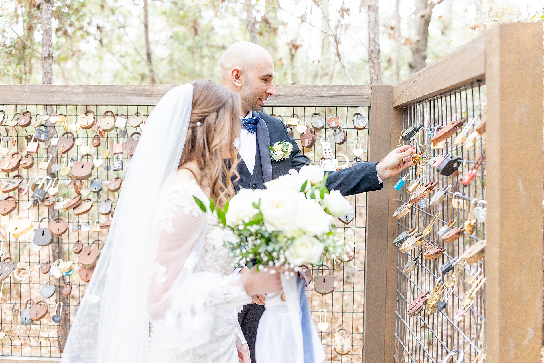 newlyweds put lock on fence