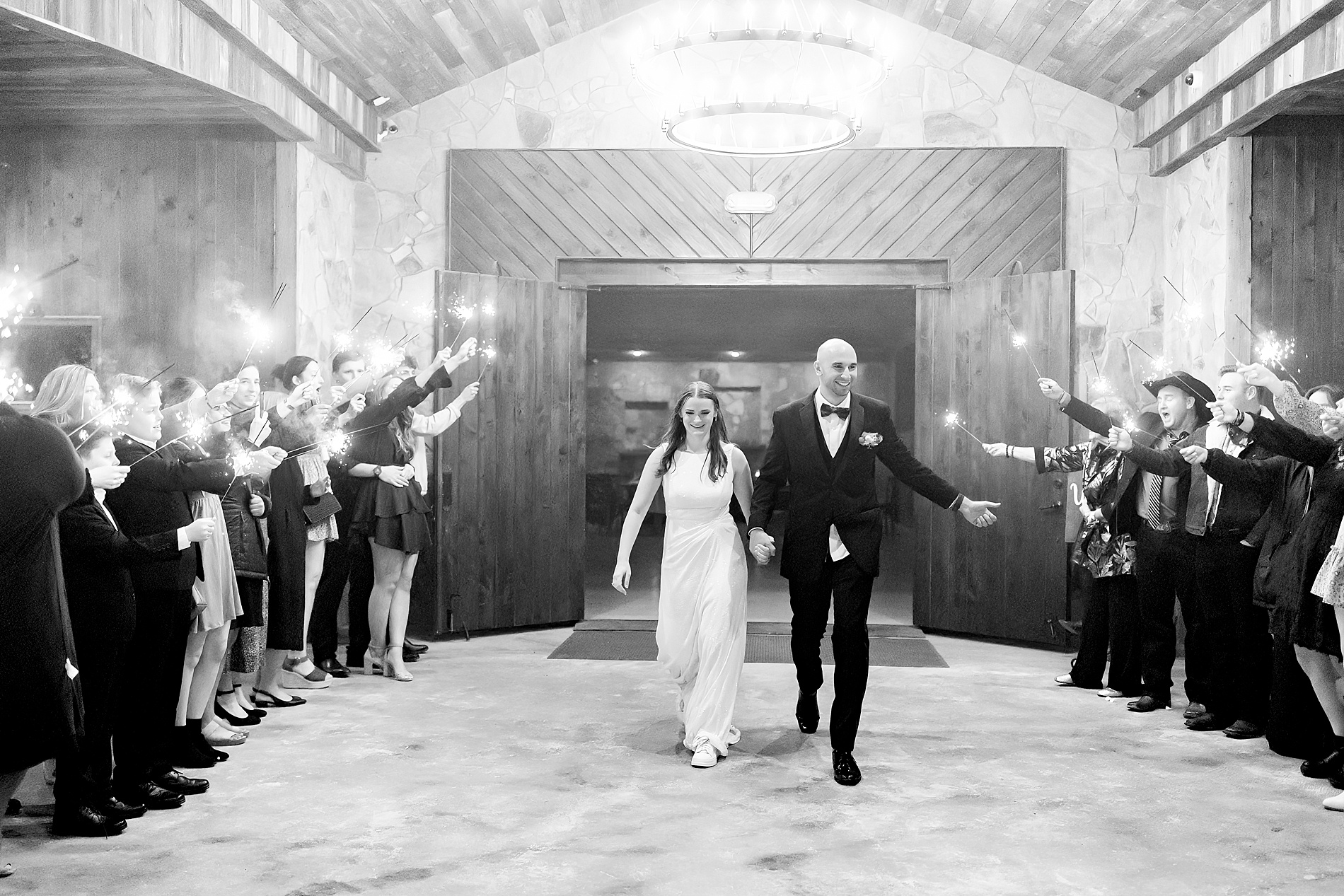 bride and groom exit wedding reception