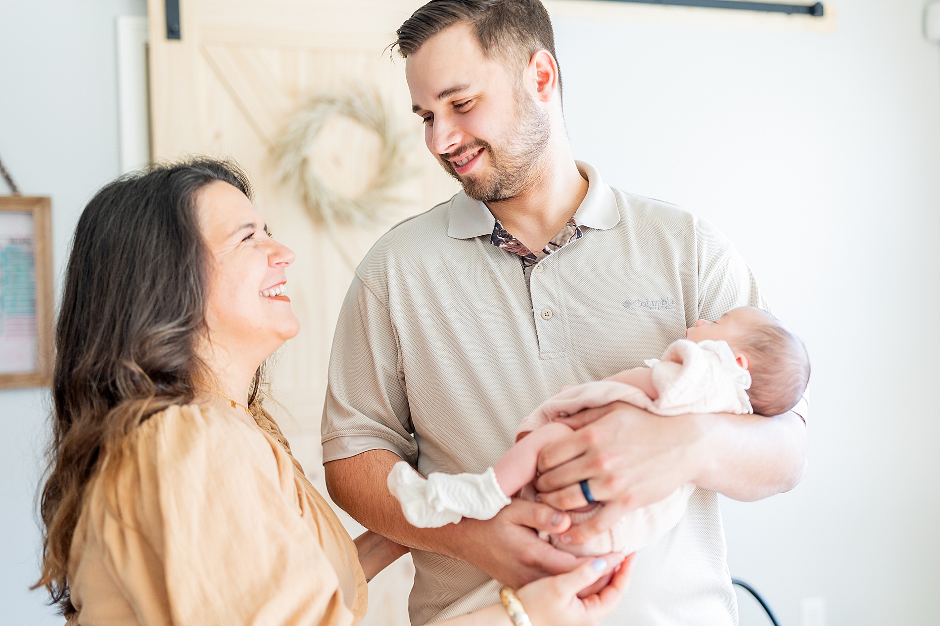 candid family photos from Greenville In-Home Newborn Session 