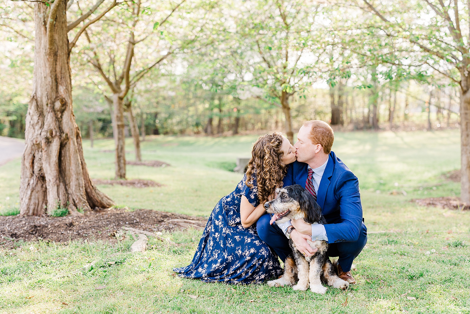 family portraits of couple with their dog
