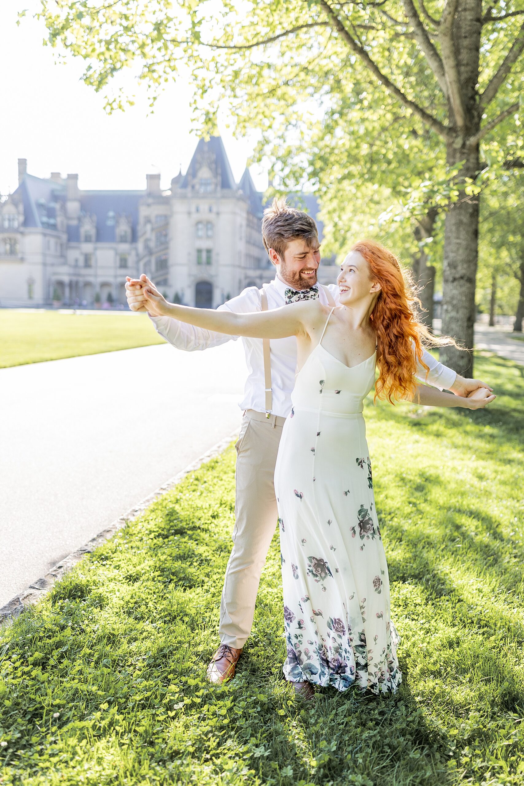 couple dance together during engagement session