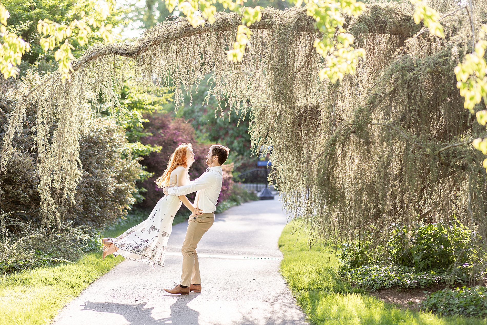 romantic engagement photos of couple dancing