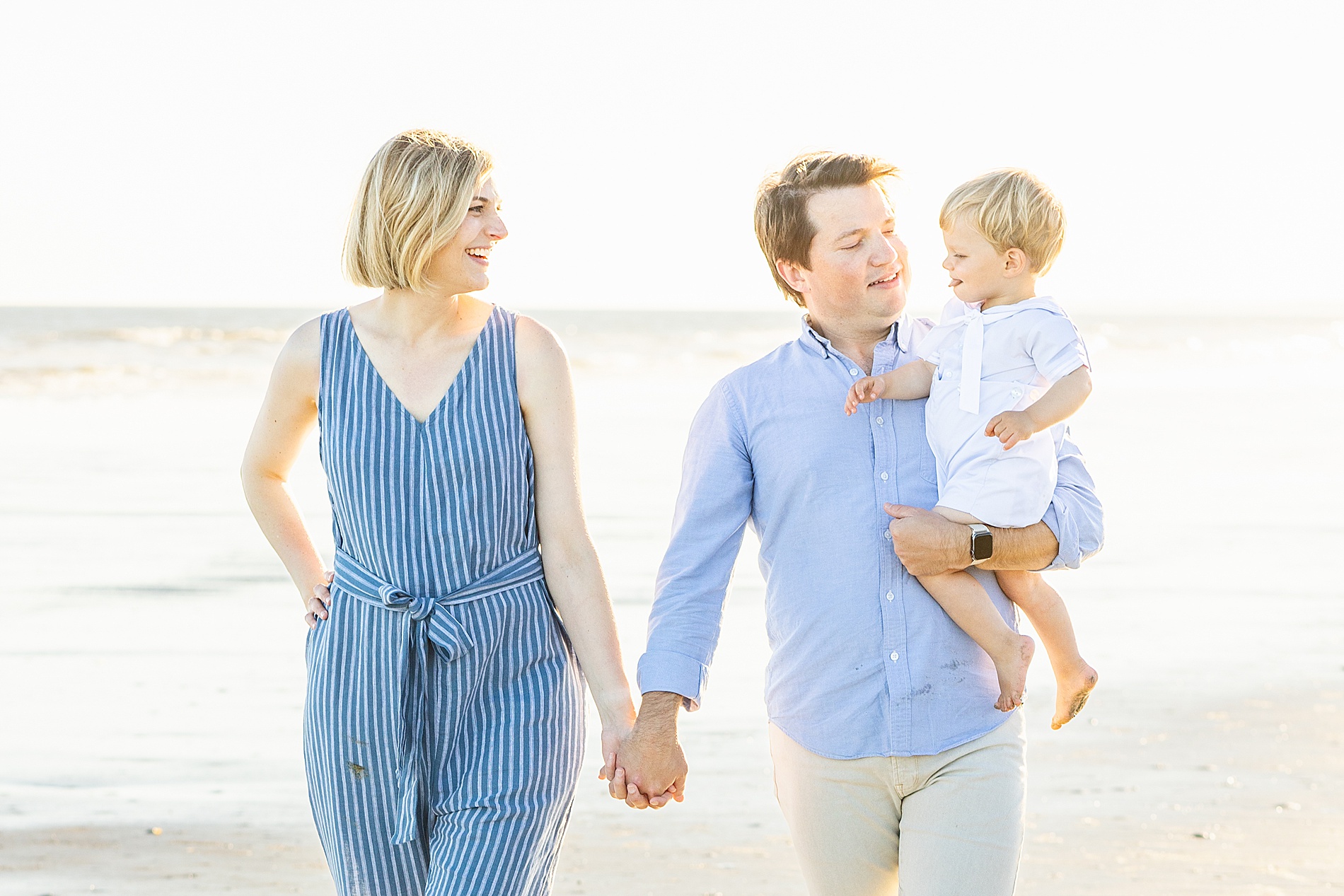 family of three on the beach in Charleston 