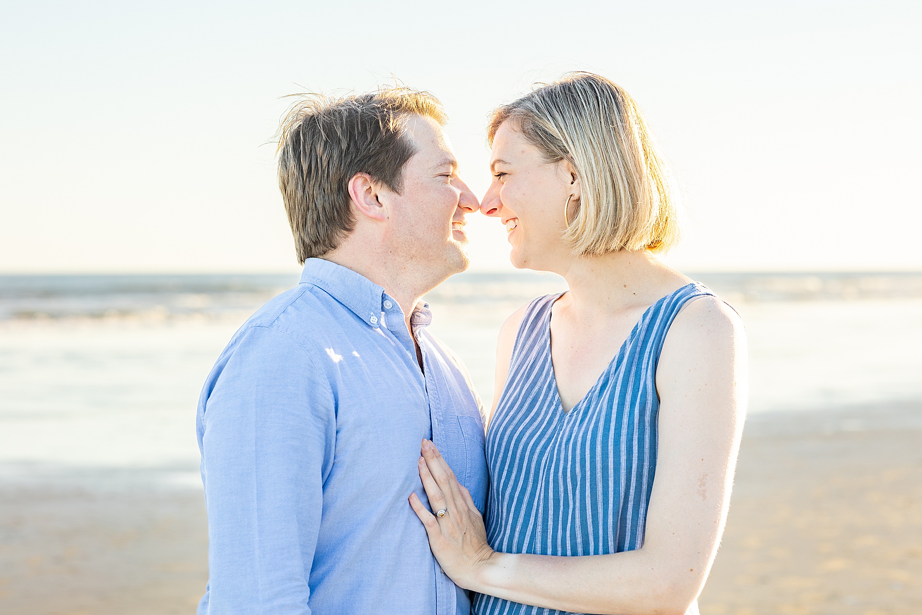 husband and wife on the beach in Charleston