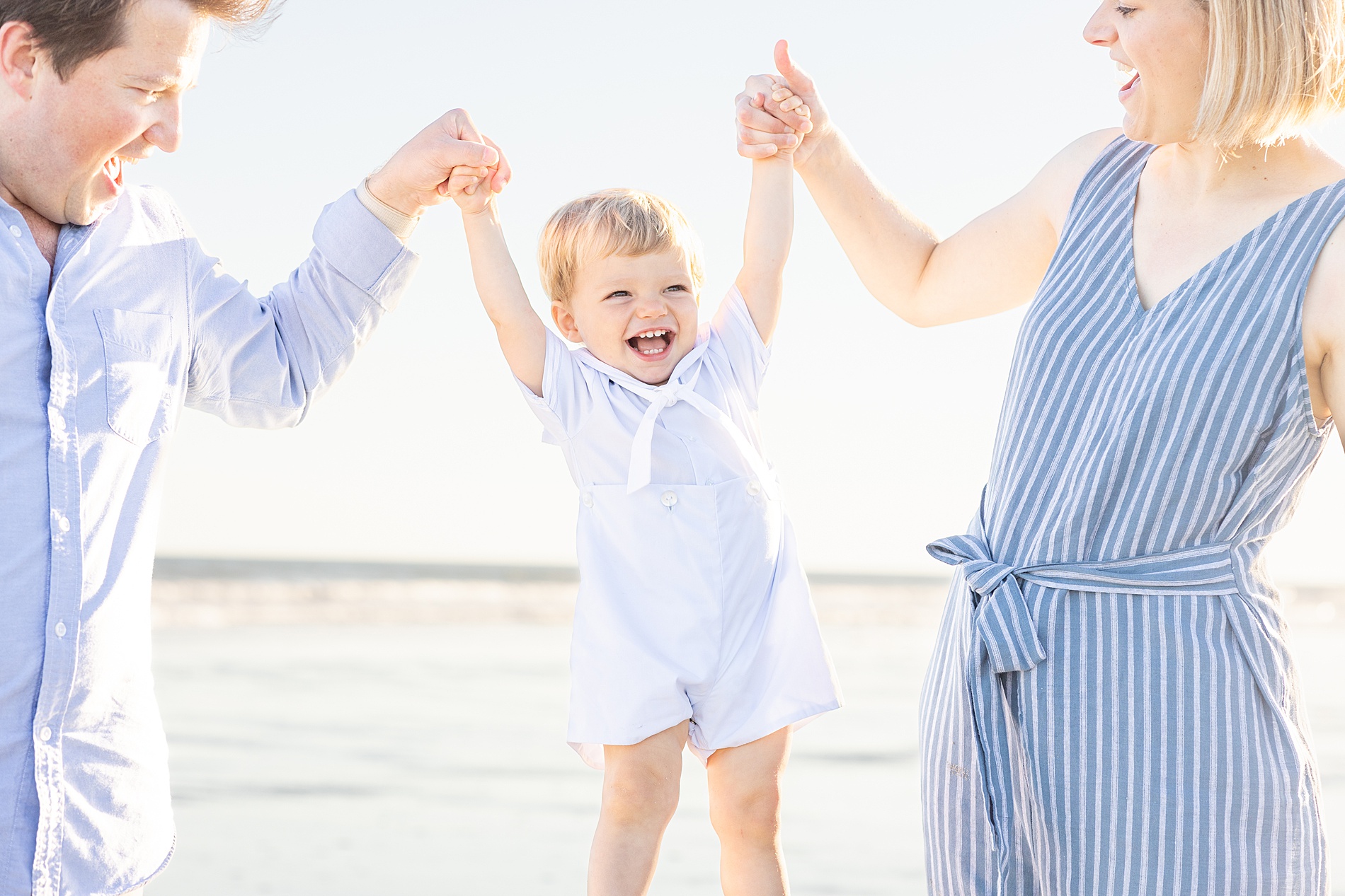 candid family portraits on Charleston beach