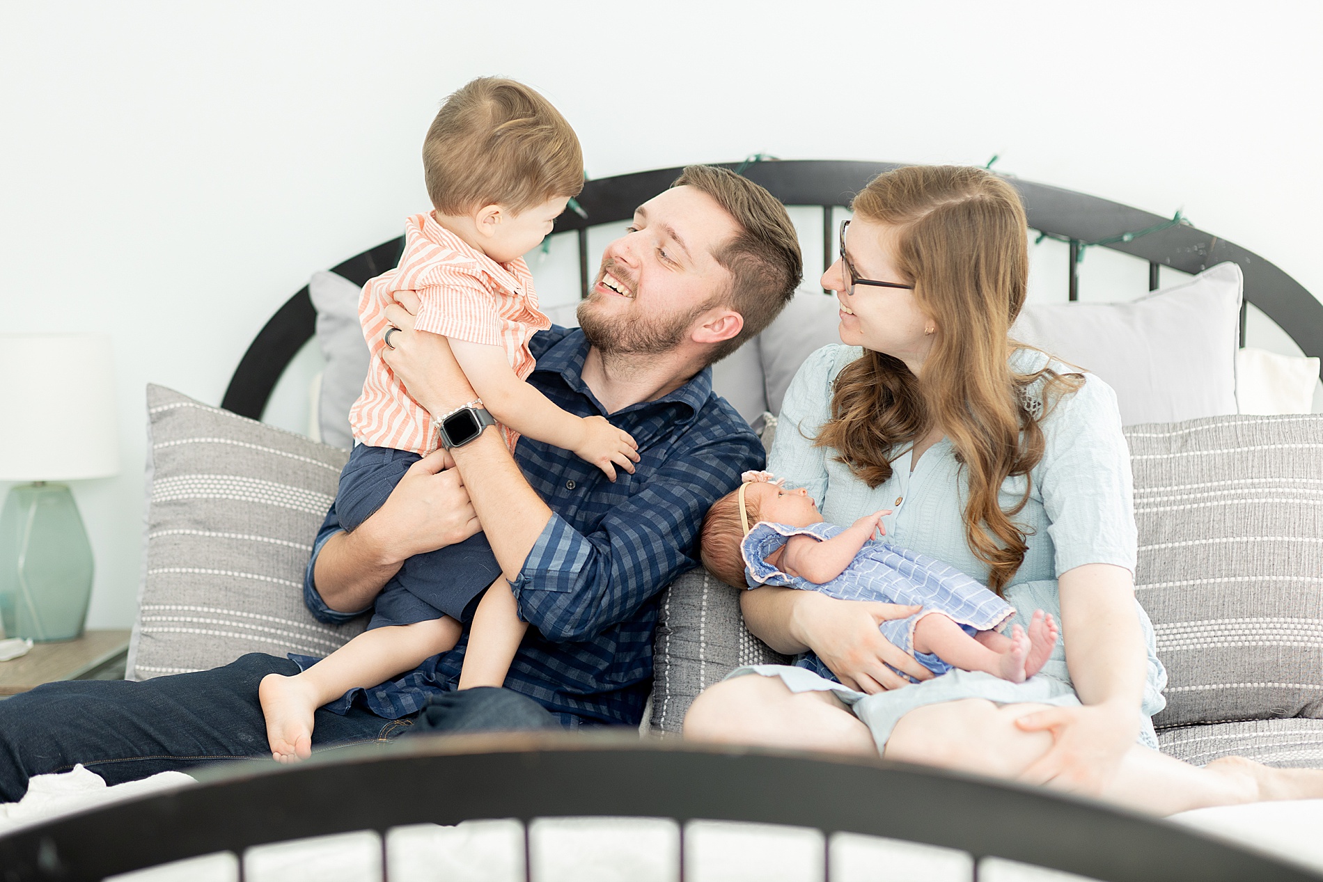 family of four during In-Home Lifestyle Newborn Session