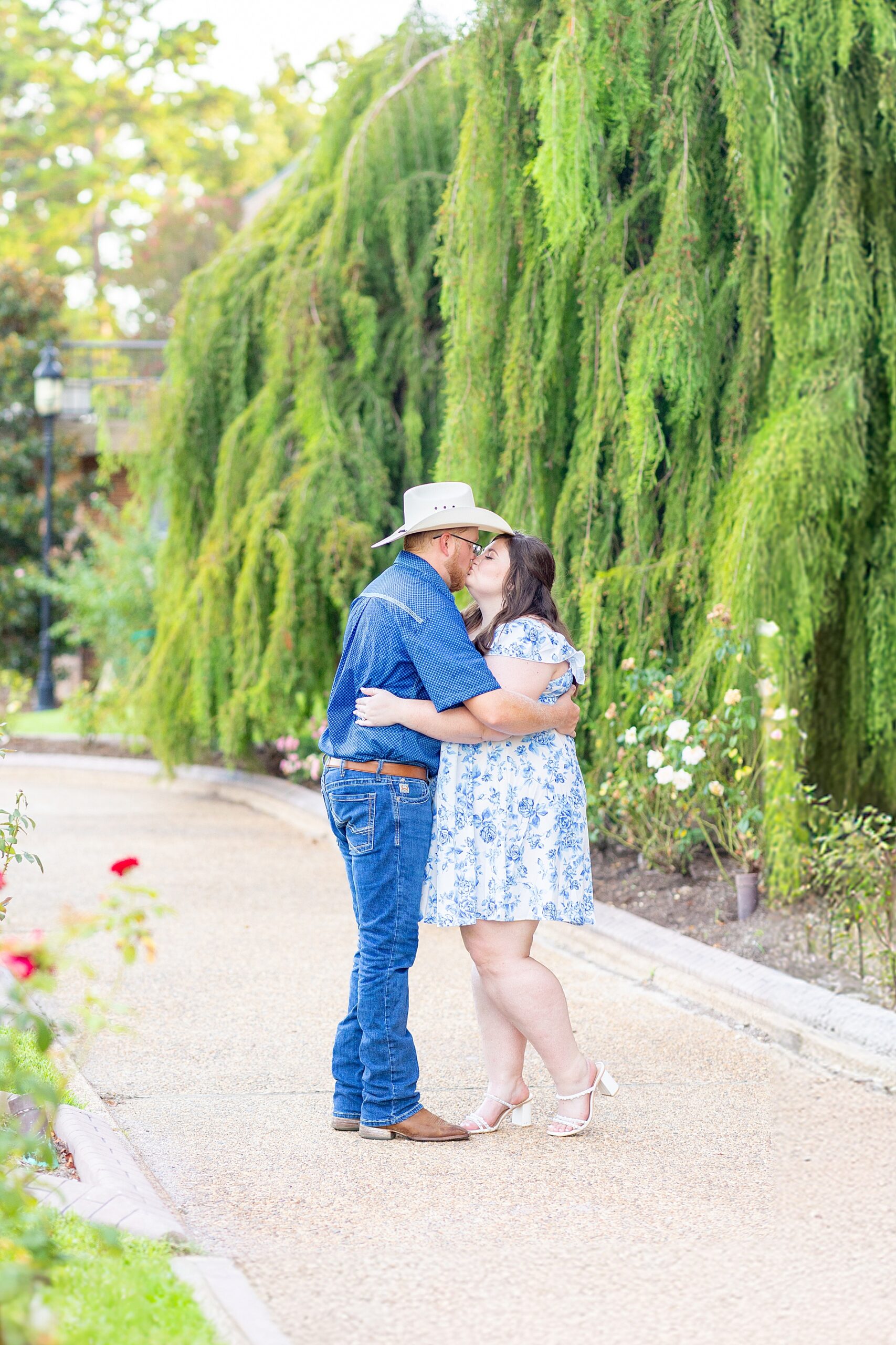 engaged couple kiss 