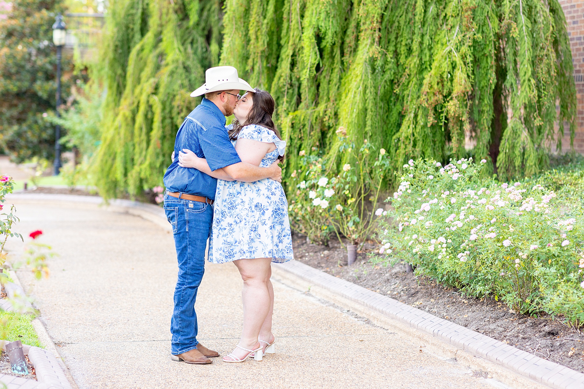 romantic engagement photos at Tyler Rose Garden