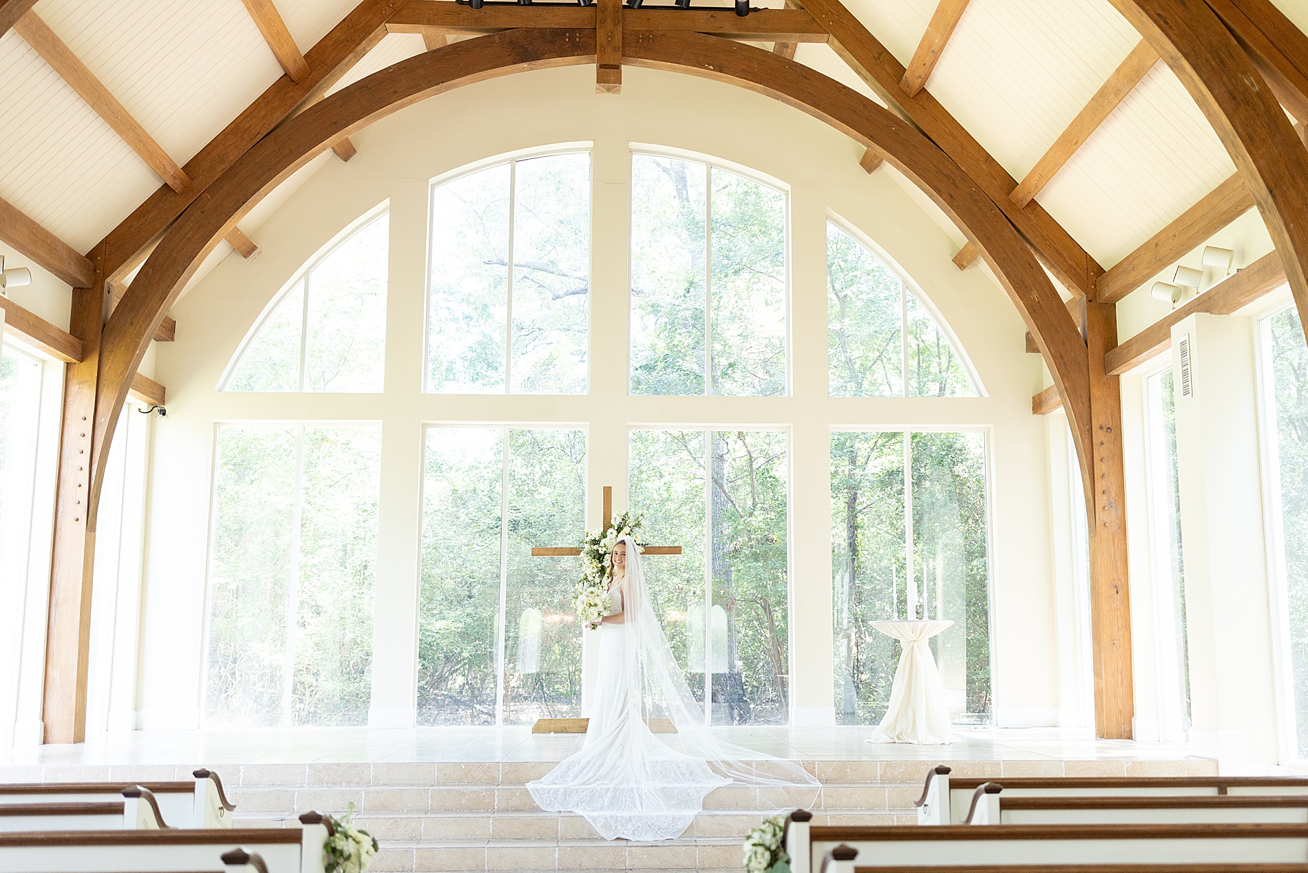 bridal portraits in chapel at Ashton Gardens