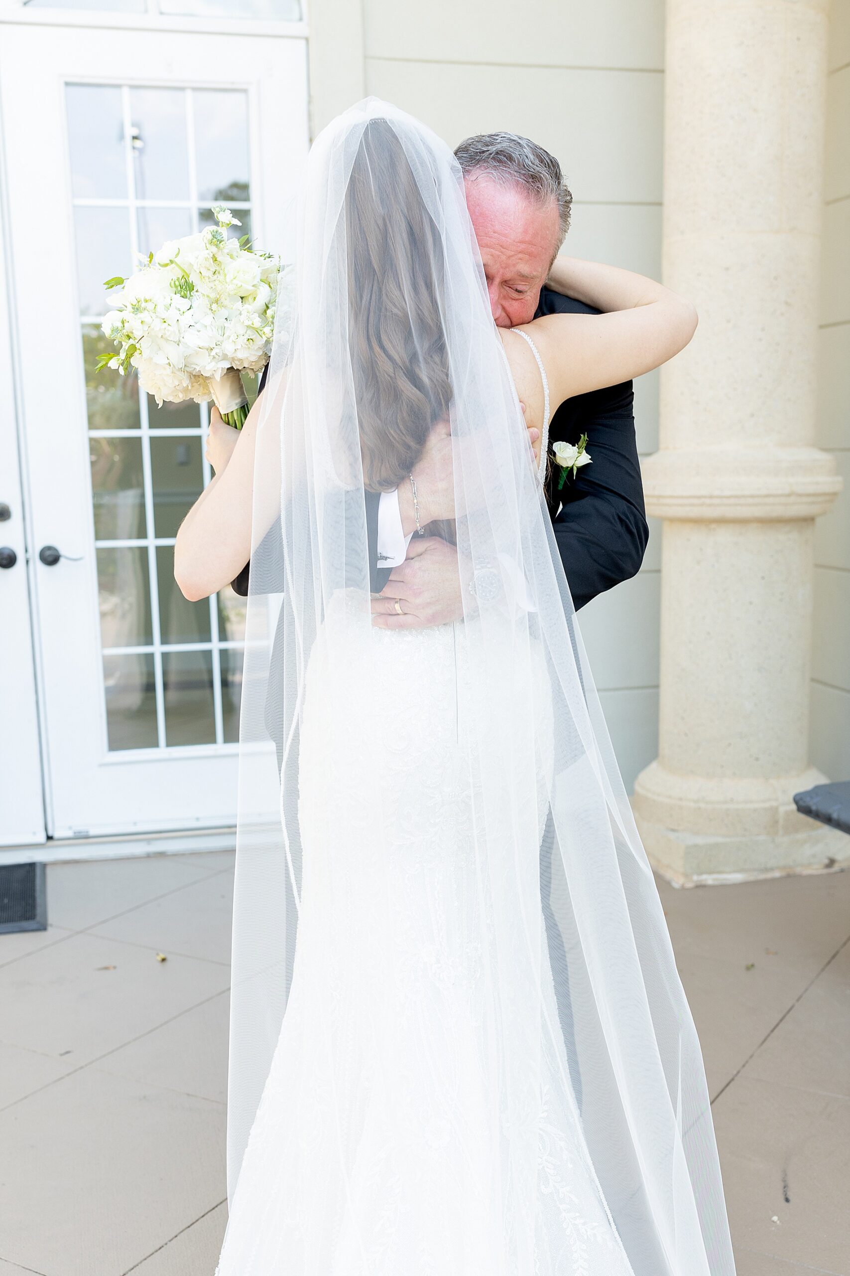 dad hugs his daughter