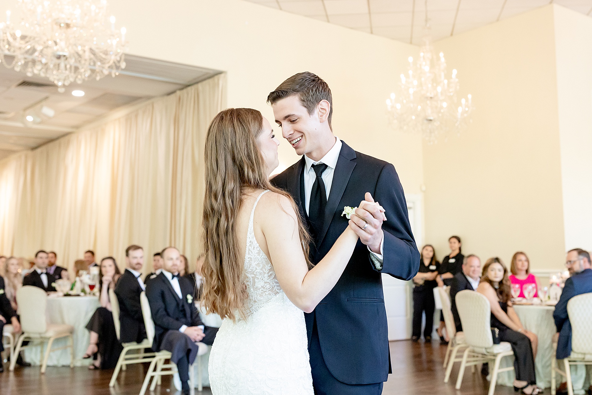 bride and groom dance at reception