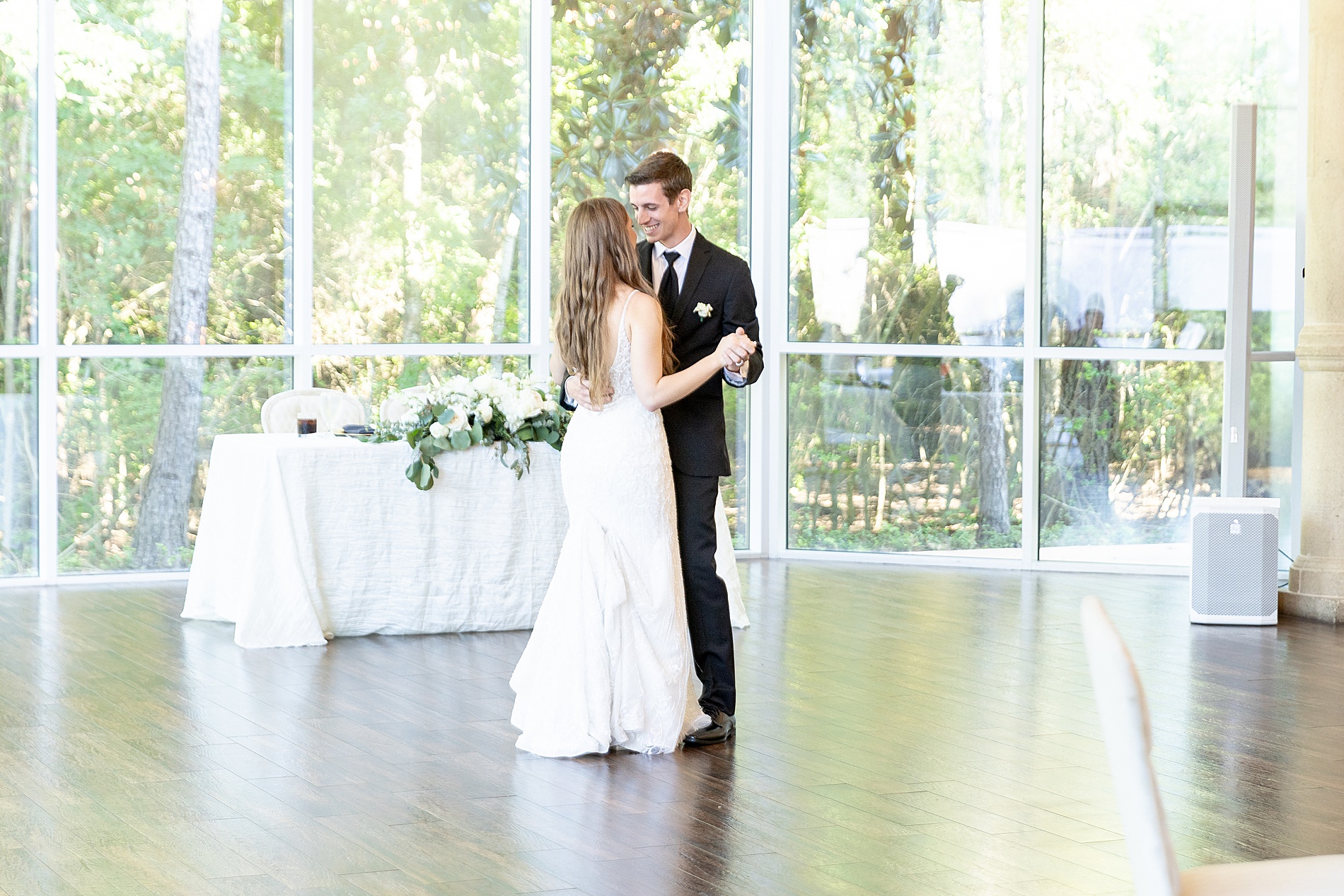 husband and wife share first dance