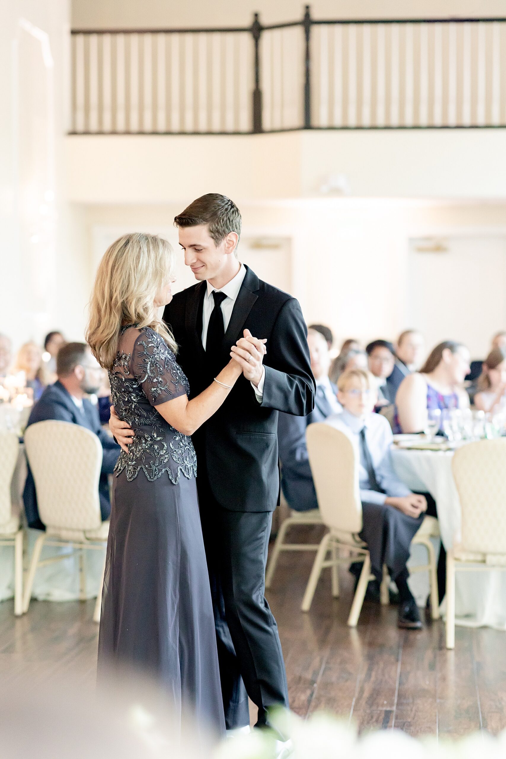 groom dances with his mom