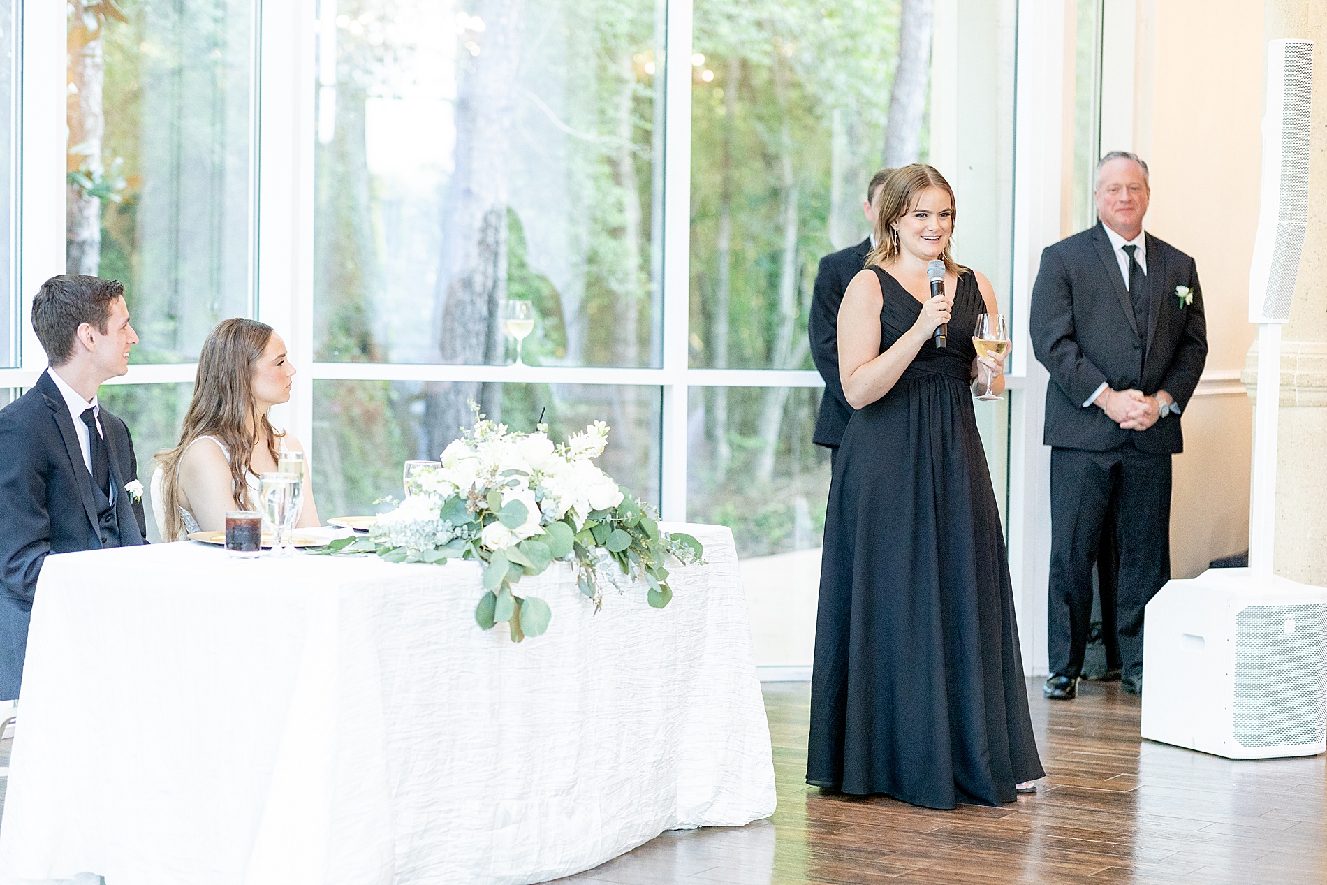 wedding toast at Classic Black and White Wedding at Ashton Gardens