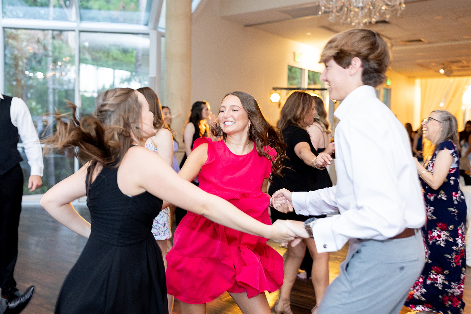 wedding guests dance at wedding reception