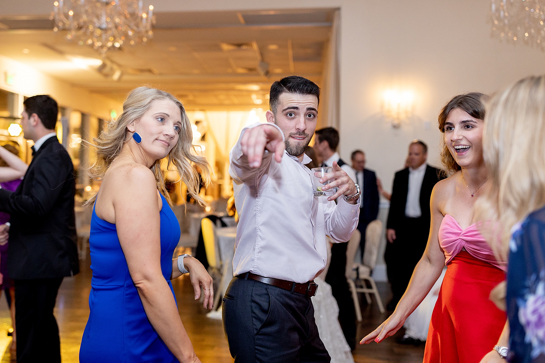 wedding guests party on the dance floor during Houston wedding at Ashton Gardens