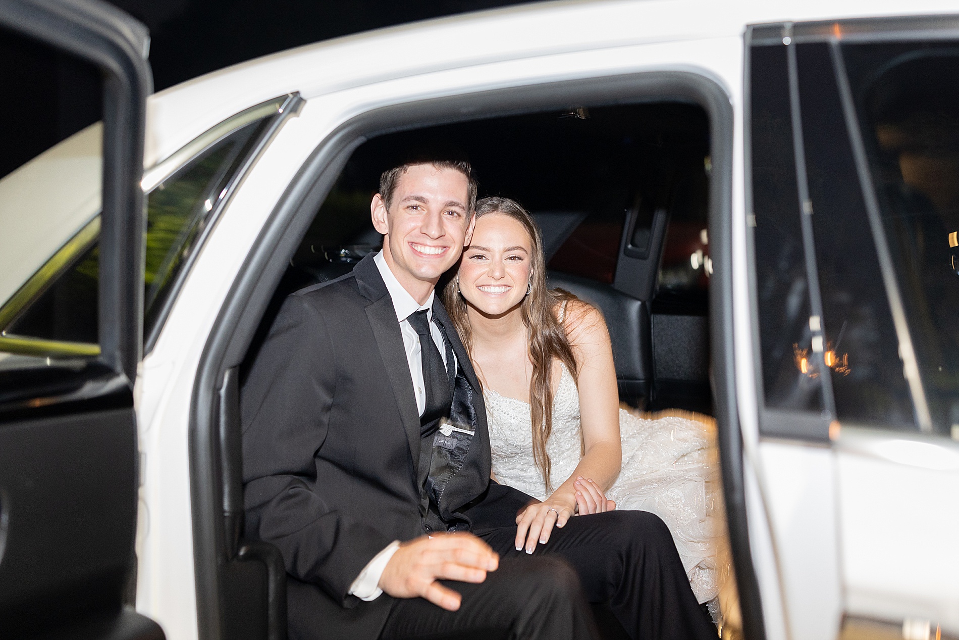 newlyweds in getaway car