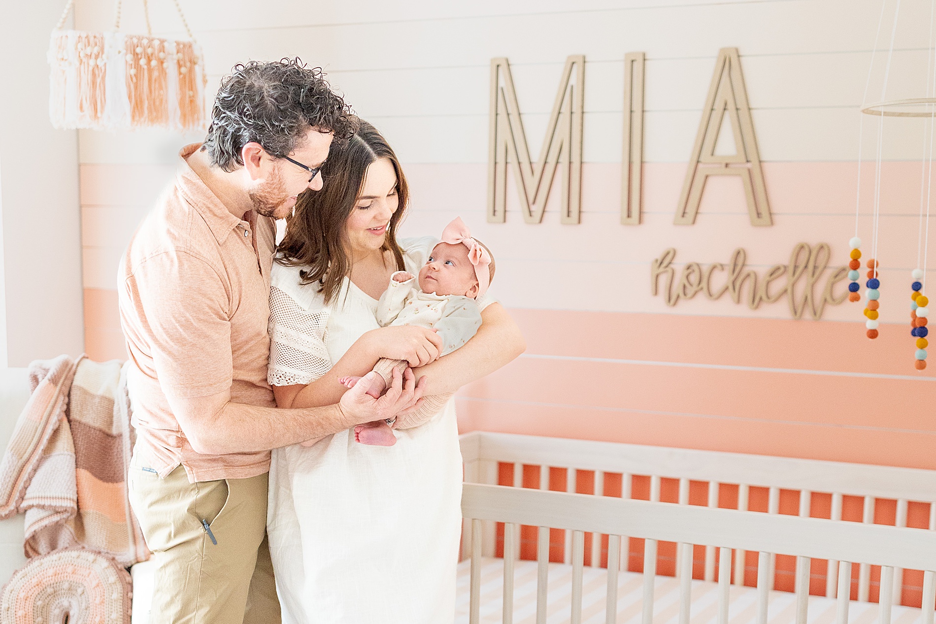 family of three during Cozy In-Home Newborn and Lifestyle Session