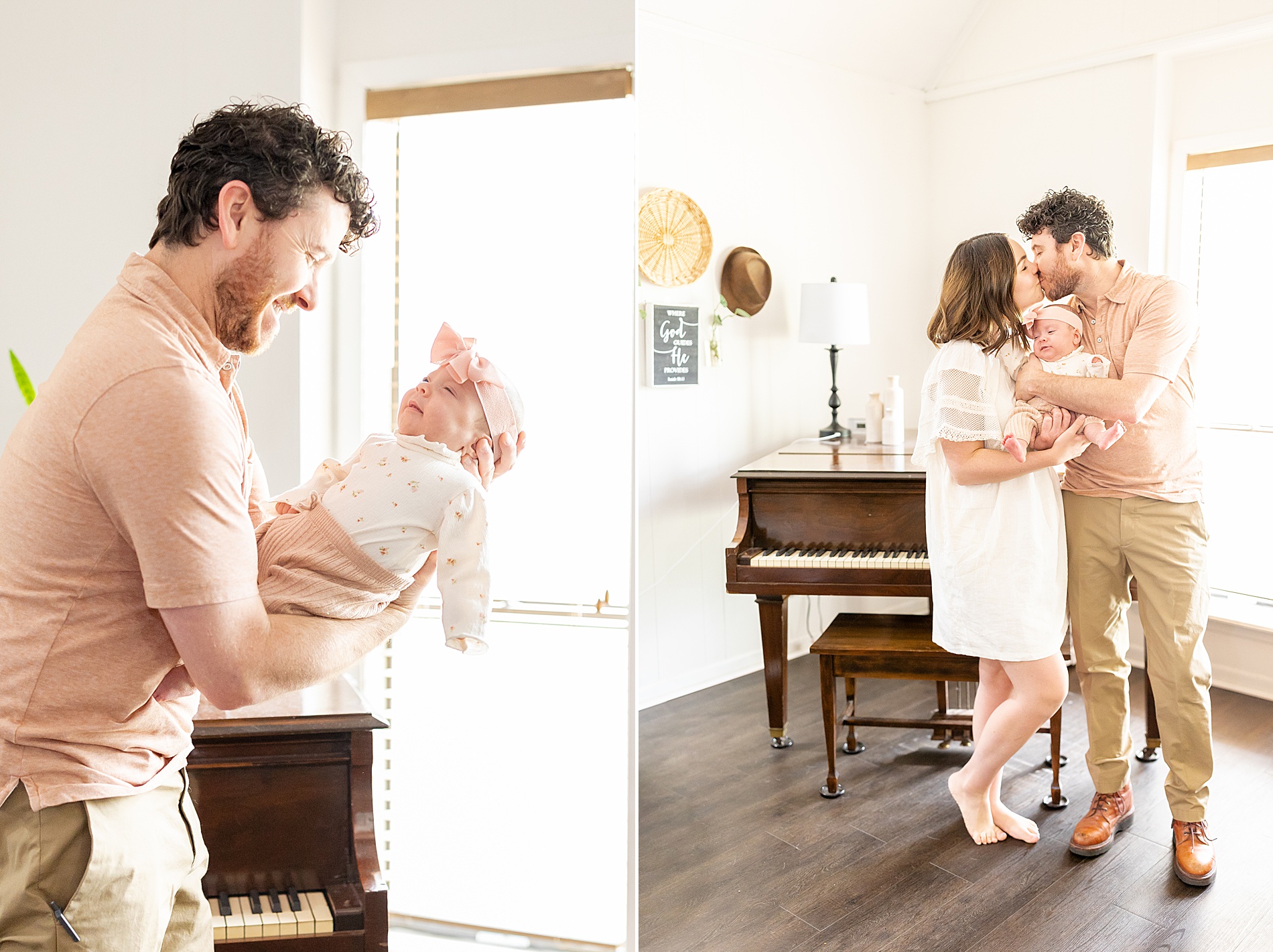 parents hold newborn in living room