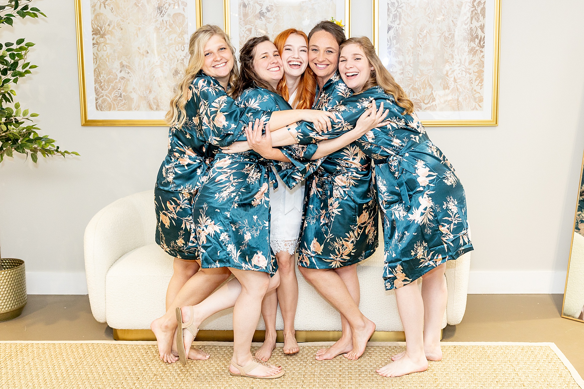 bride with bridesmaids in matching robes