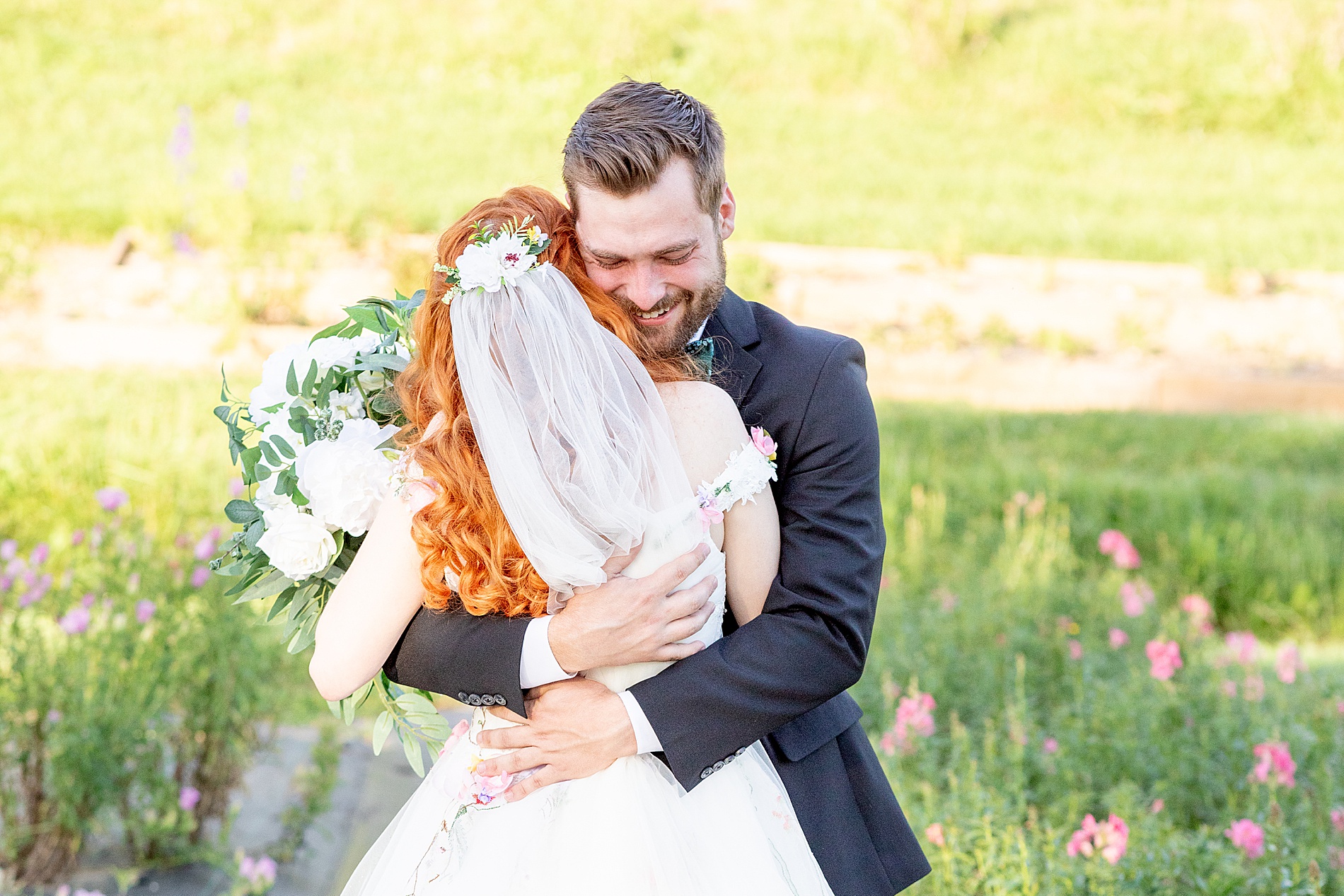 bride and groom hug during first look