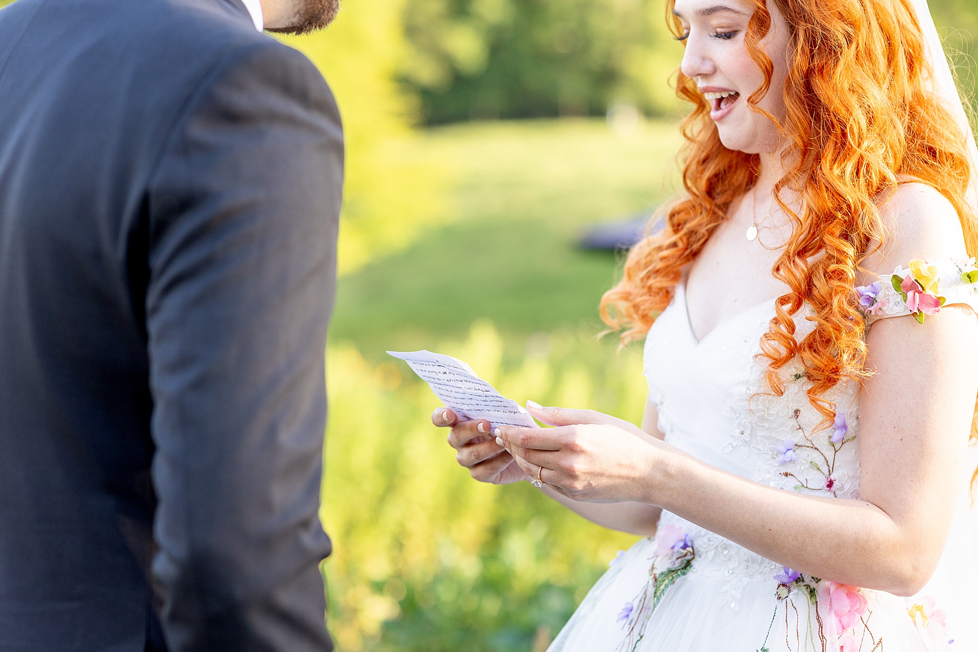 bride reads vows to groom