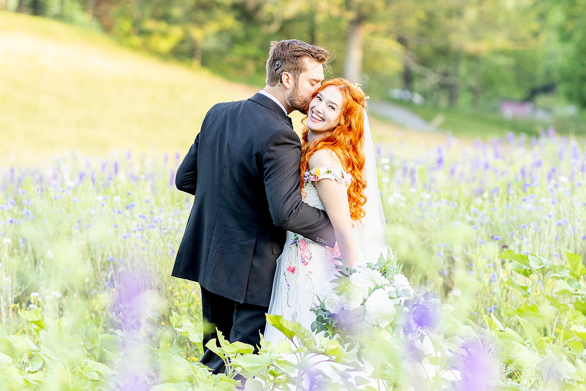 groom kisses bride 