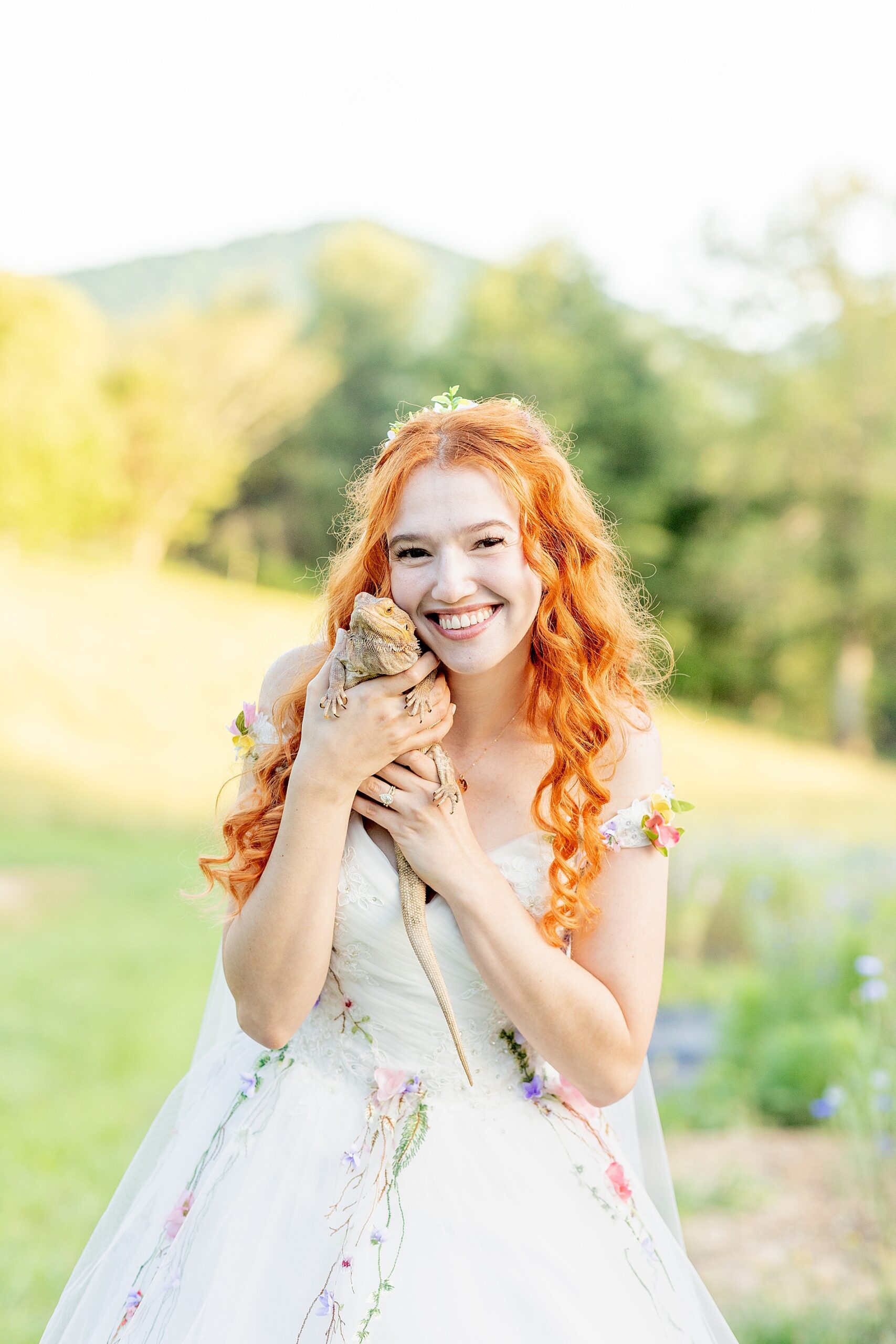 bride holds bearded dragon