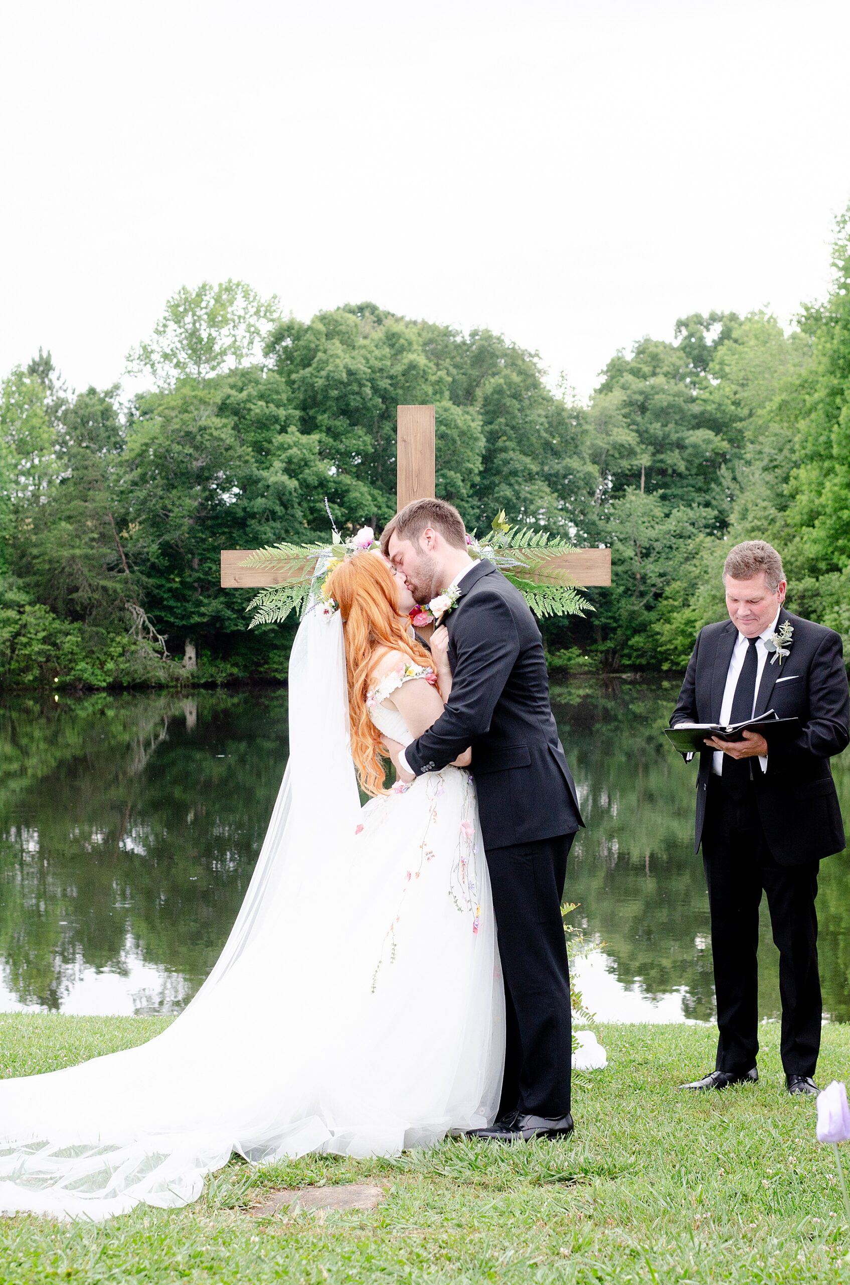 bride and groom kiss