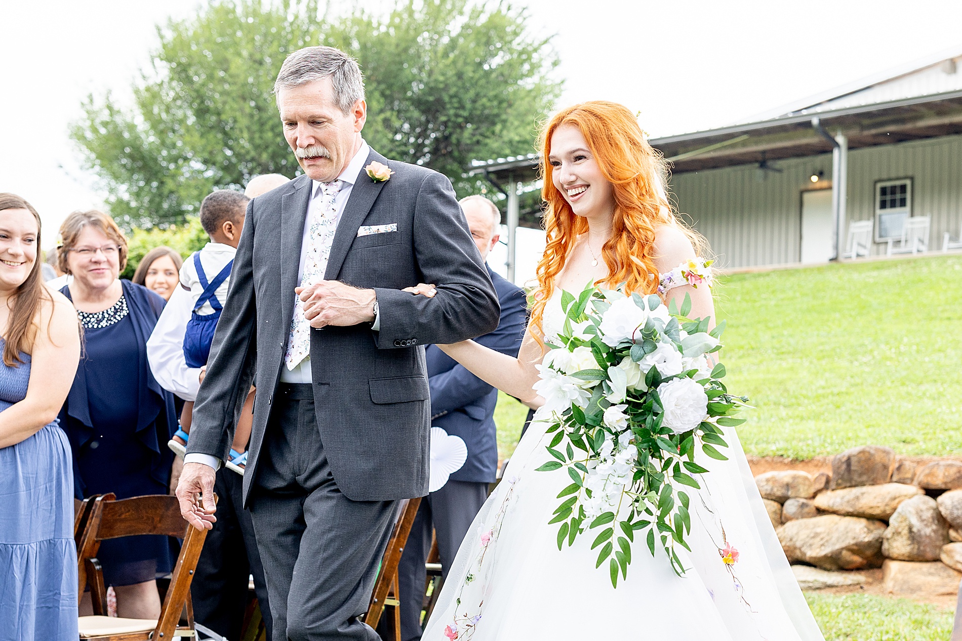 father walks daughter down the aisle 