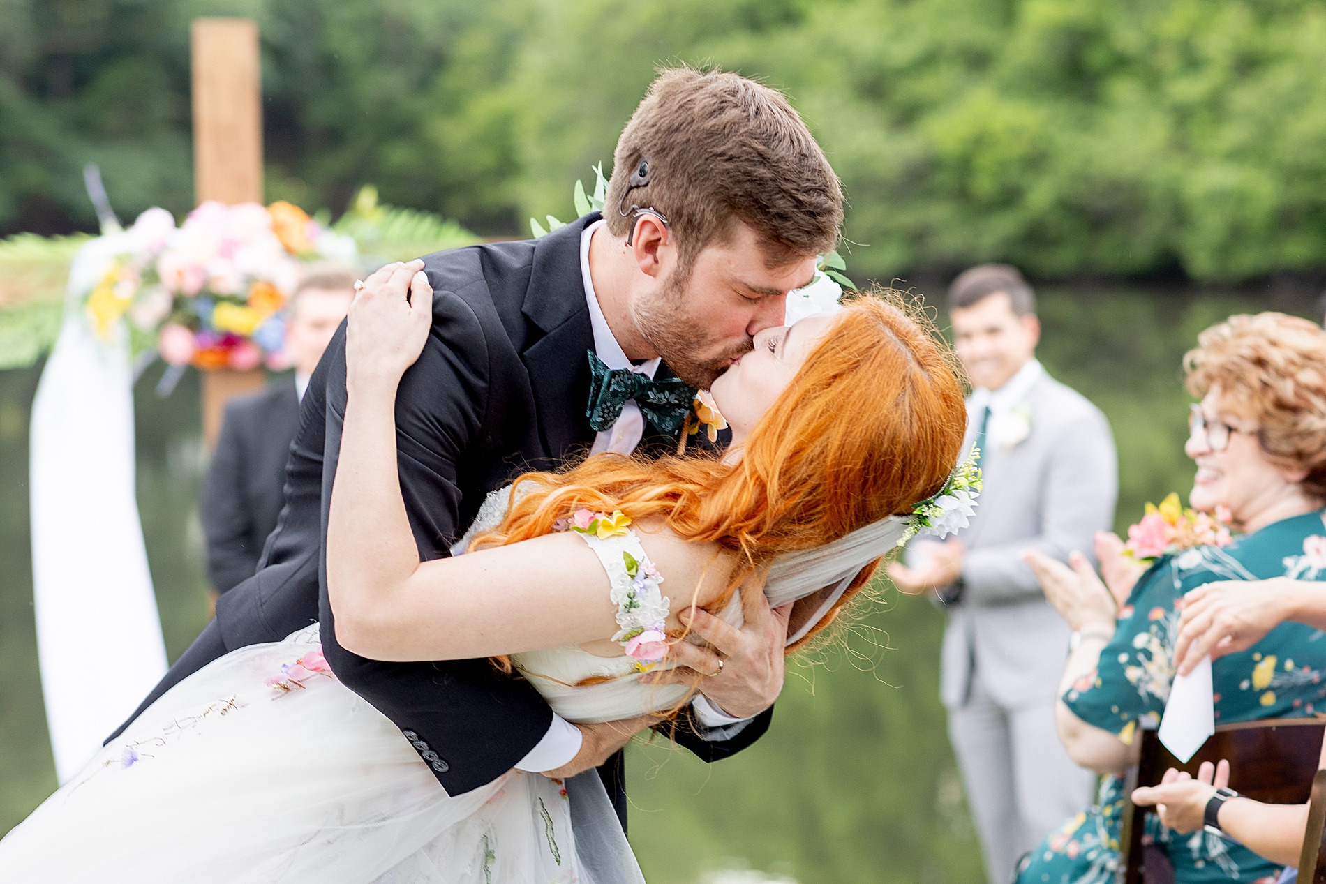 groom kisses bride 