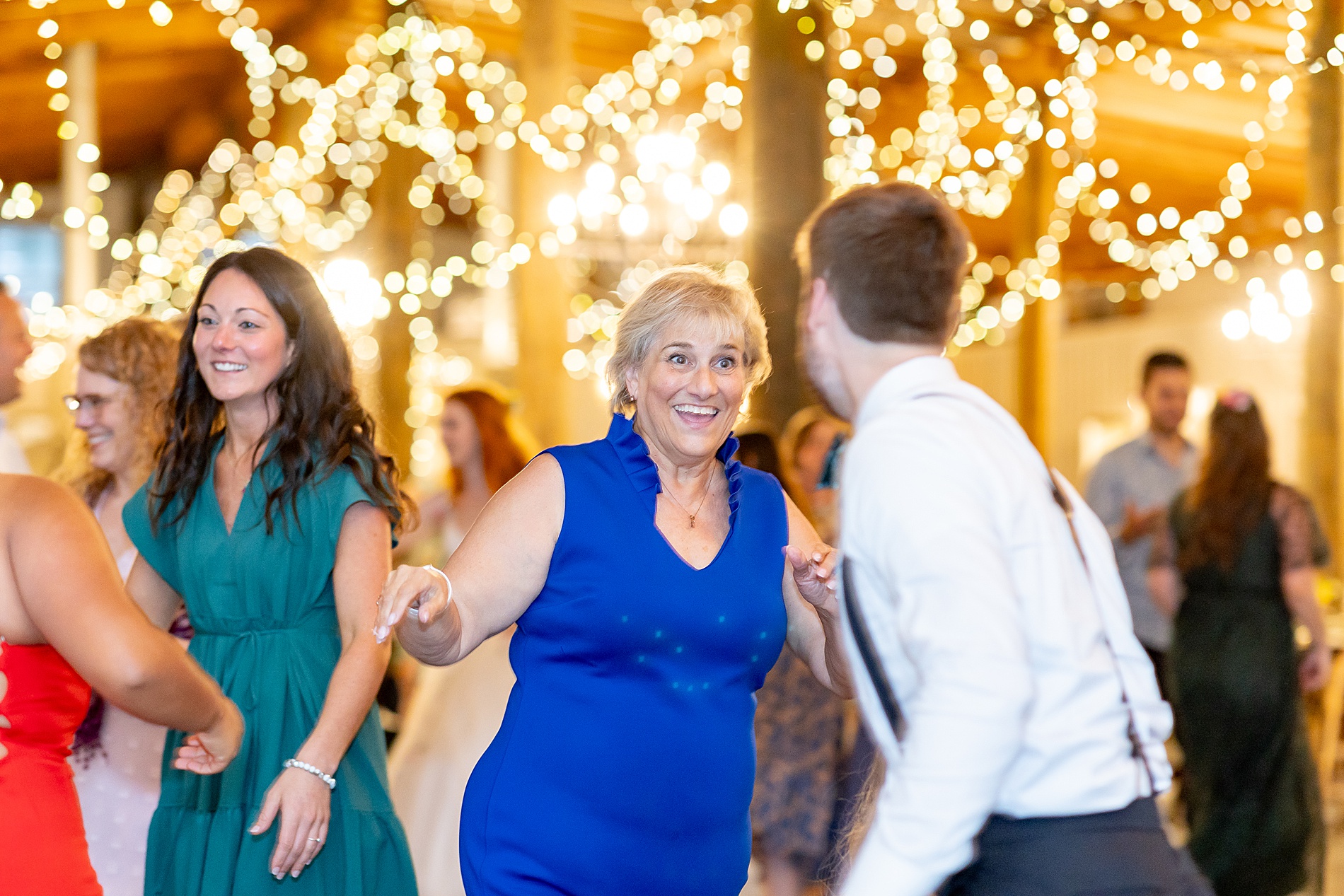 guests dance at wedding reception at Green Brier Farms