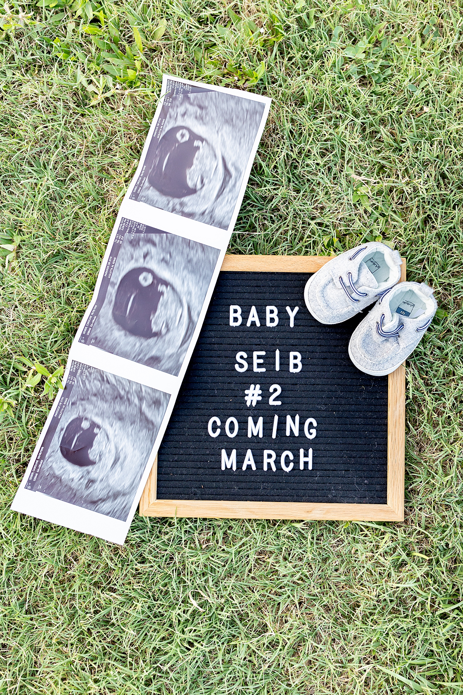 baby number 2 sign with ultrasound photo and shoes