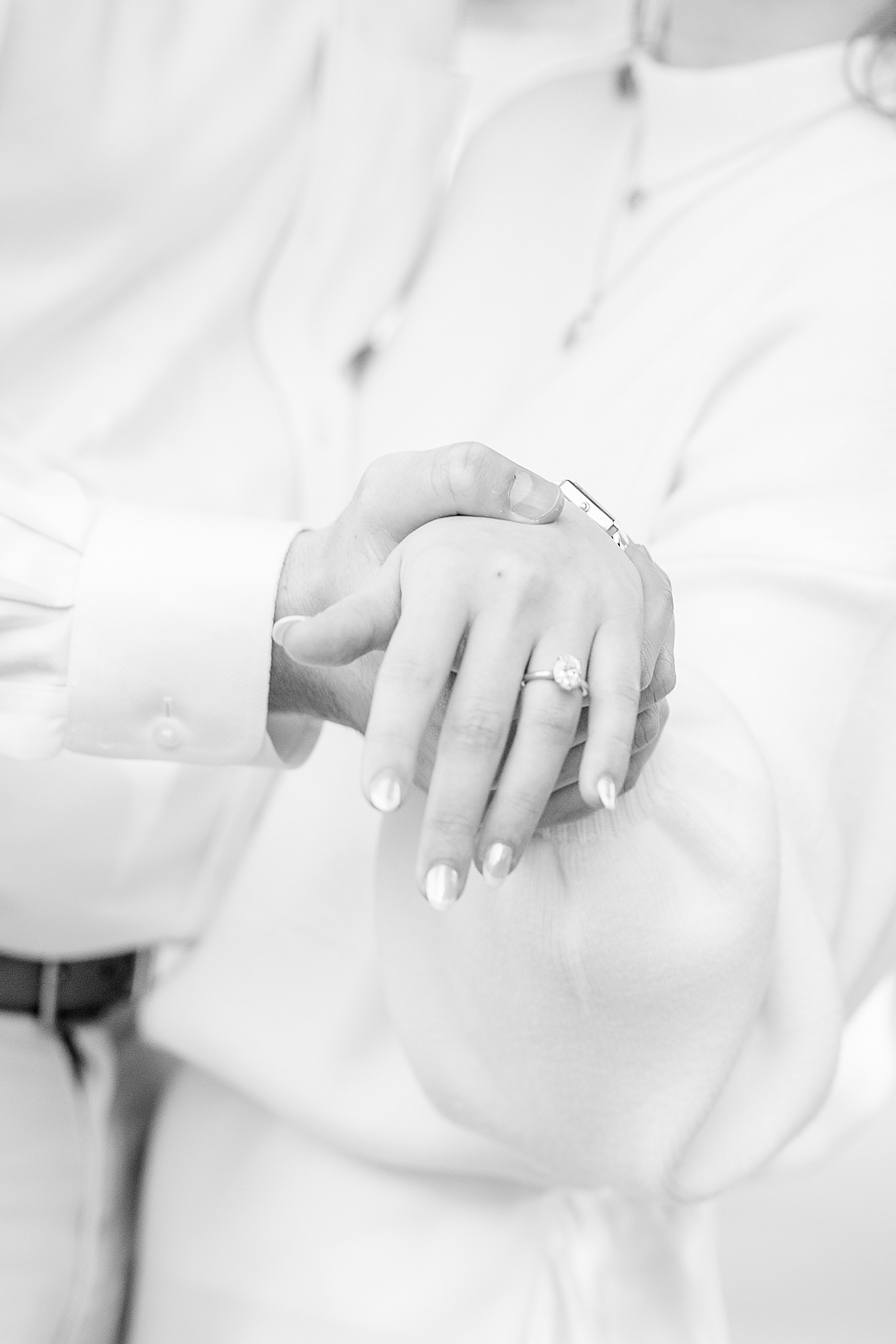 couple shows off engagement ring