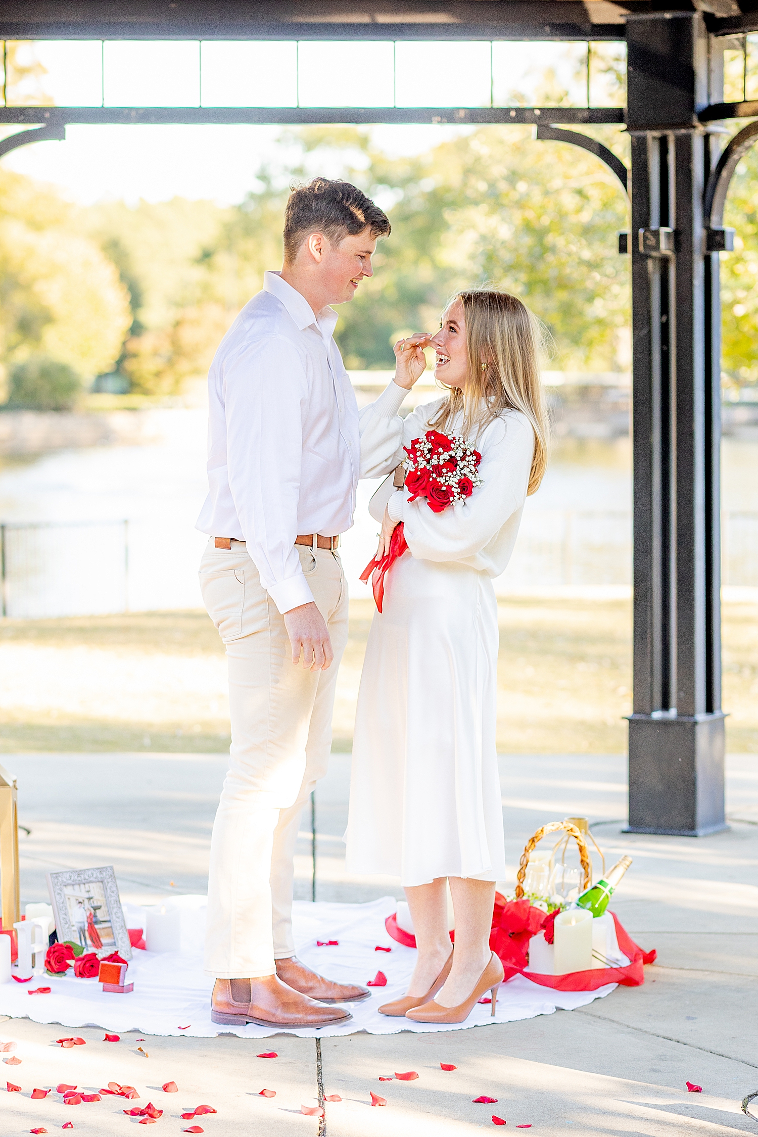 woman wipes away tears after proposal