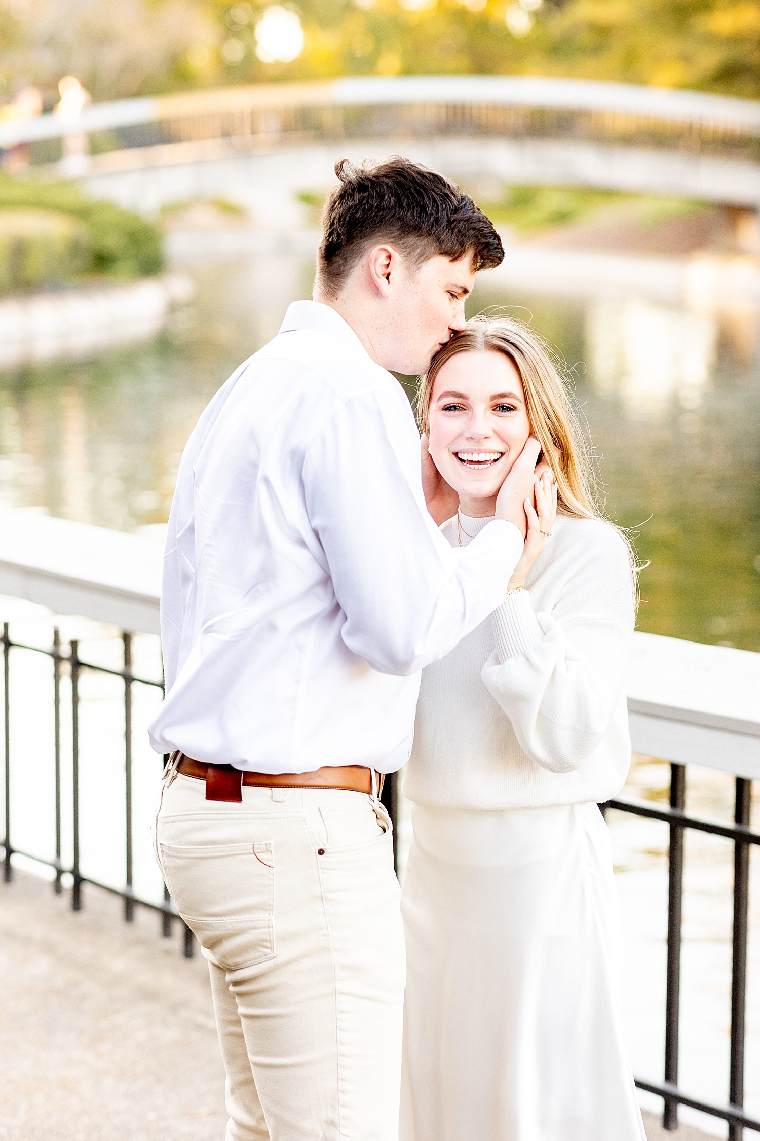 candid couples portraits after Surprise Proposal in Pullen Park