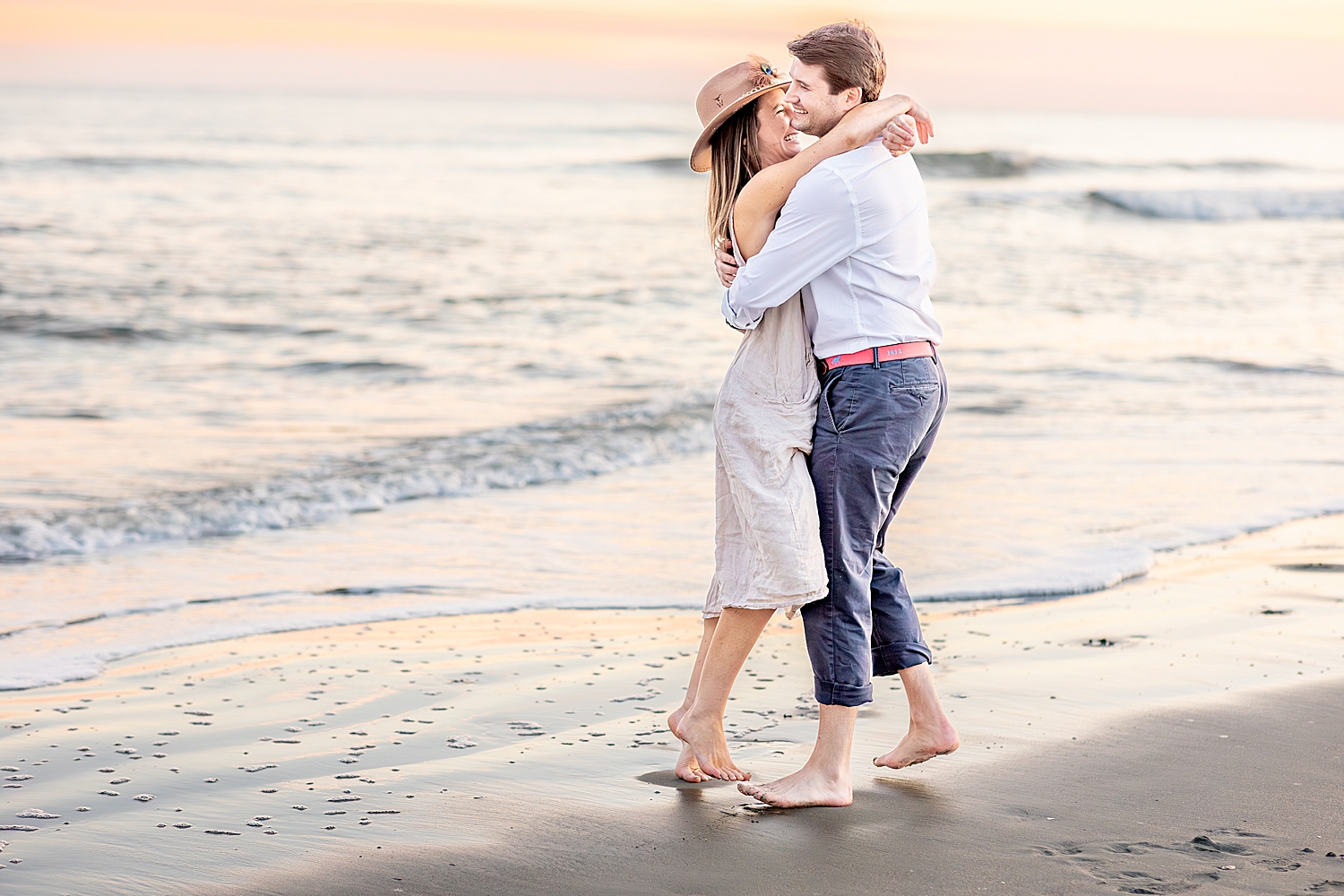 candid engagement photos at Folly Beach