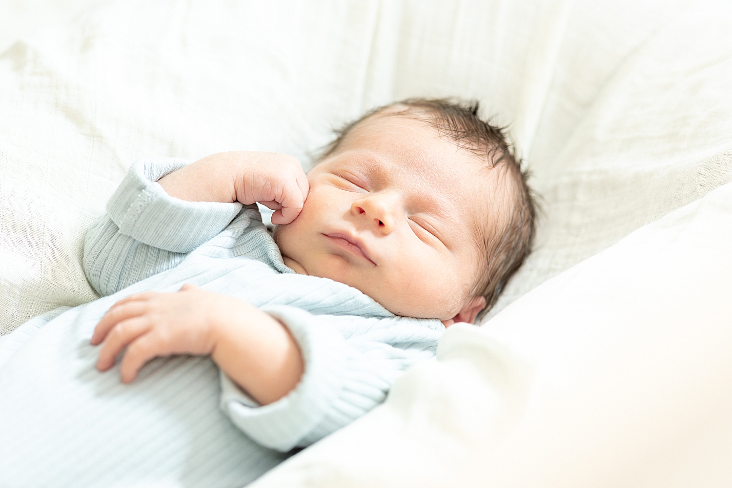 sleeping newborn boy