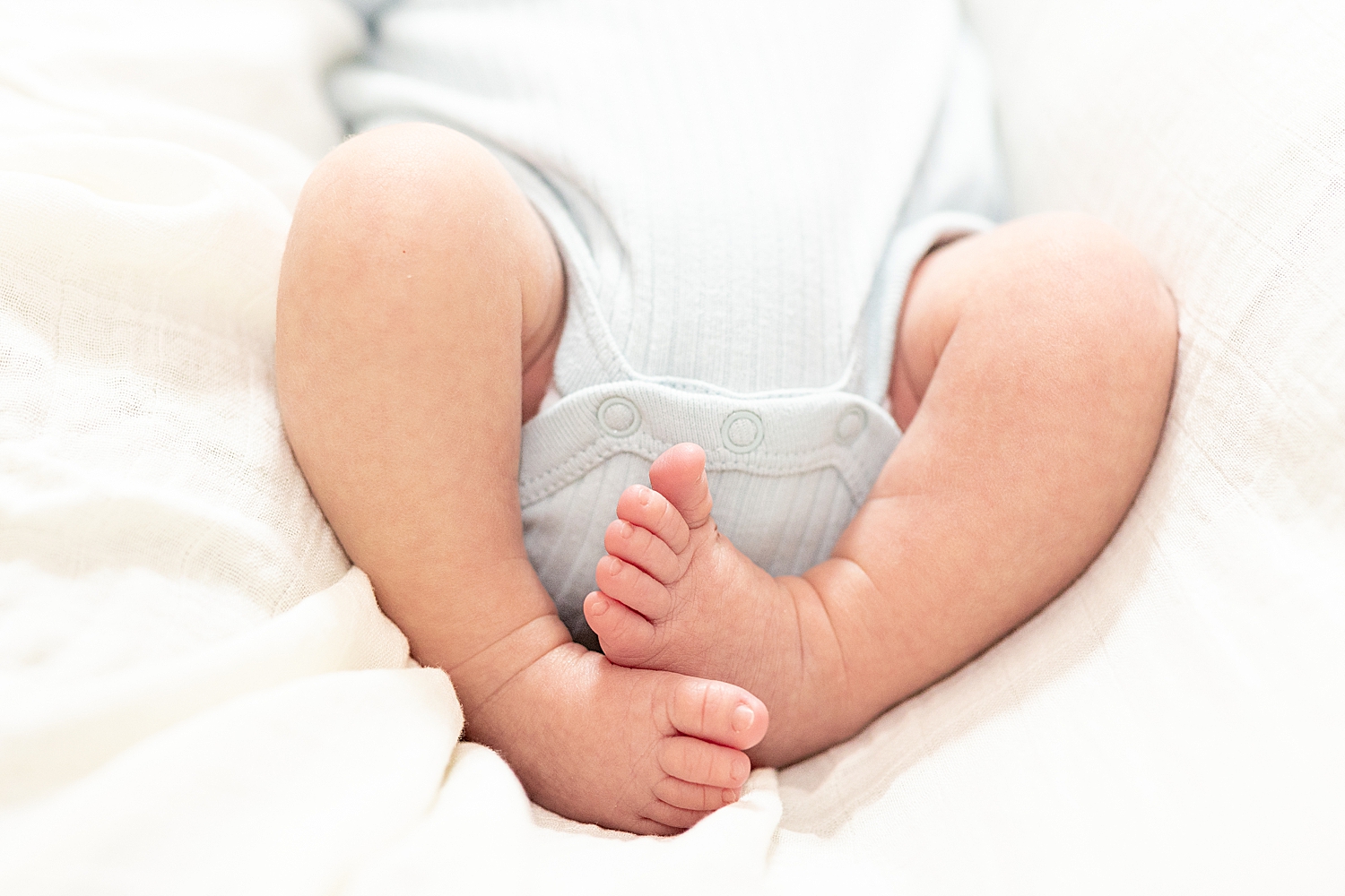 tiny toes of newborn boy