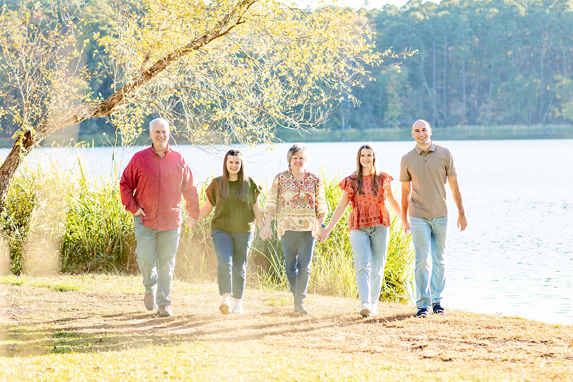 parents with their adult children and spouse during family portraits at Tyler State Park   