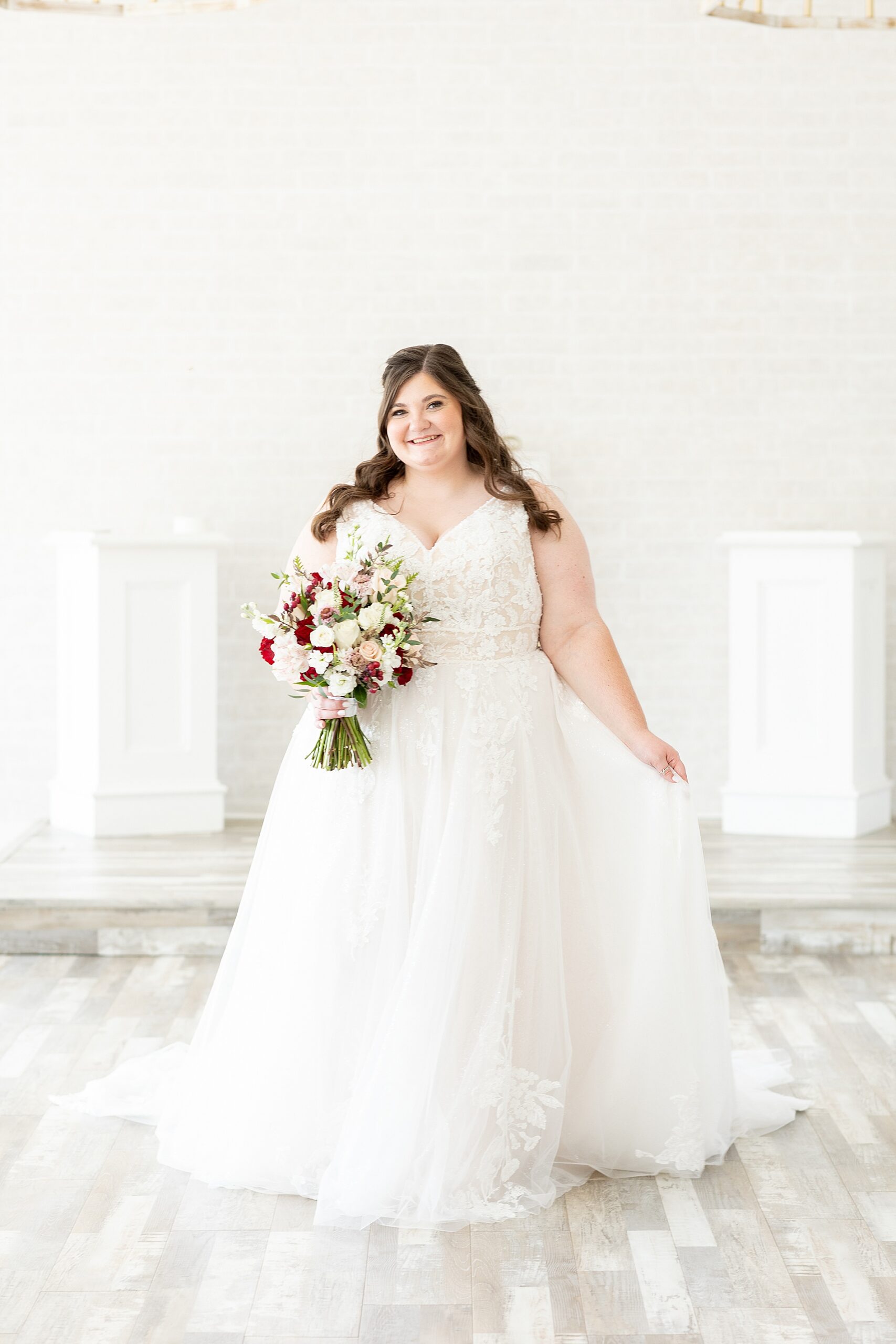 bride in elegant wedding dress with romantic wedding bouquet 