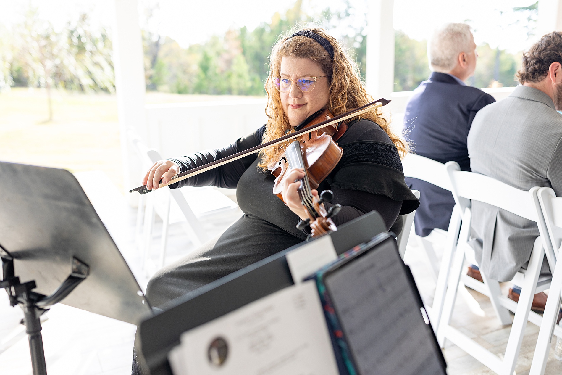 strings play at wedding ceremony