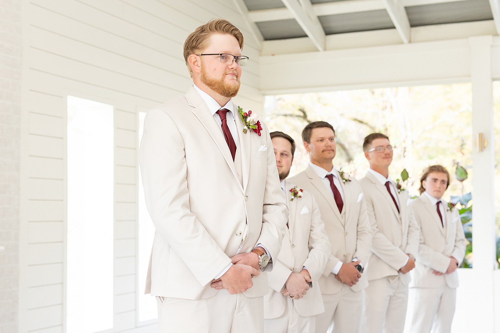 groom waits for bride at alter 