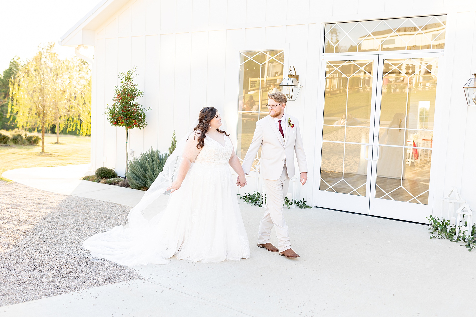 couple outside wedding venue in East Texas