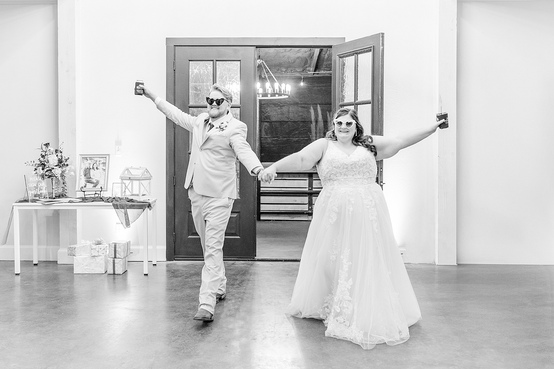 newlyweds enter wedding reception